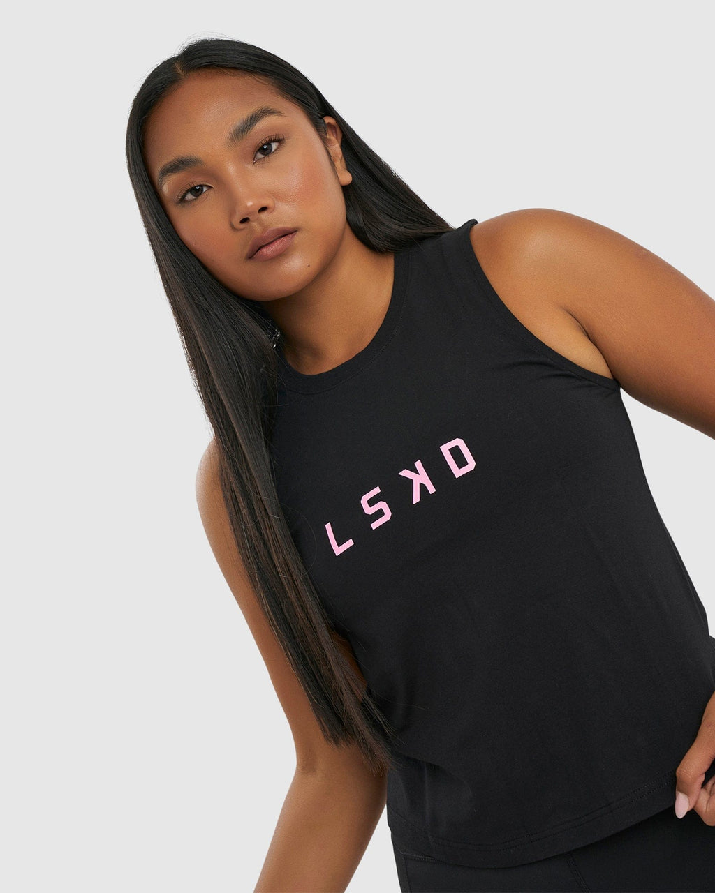 Model wearing Rep Tank - Black-Petal Pink