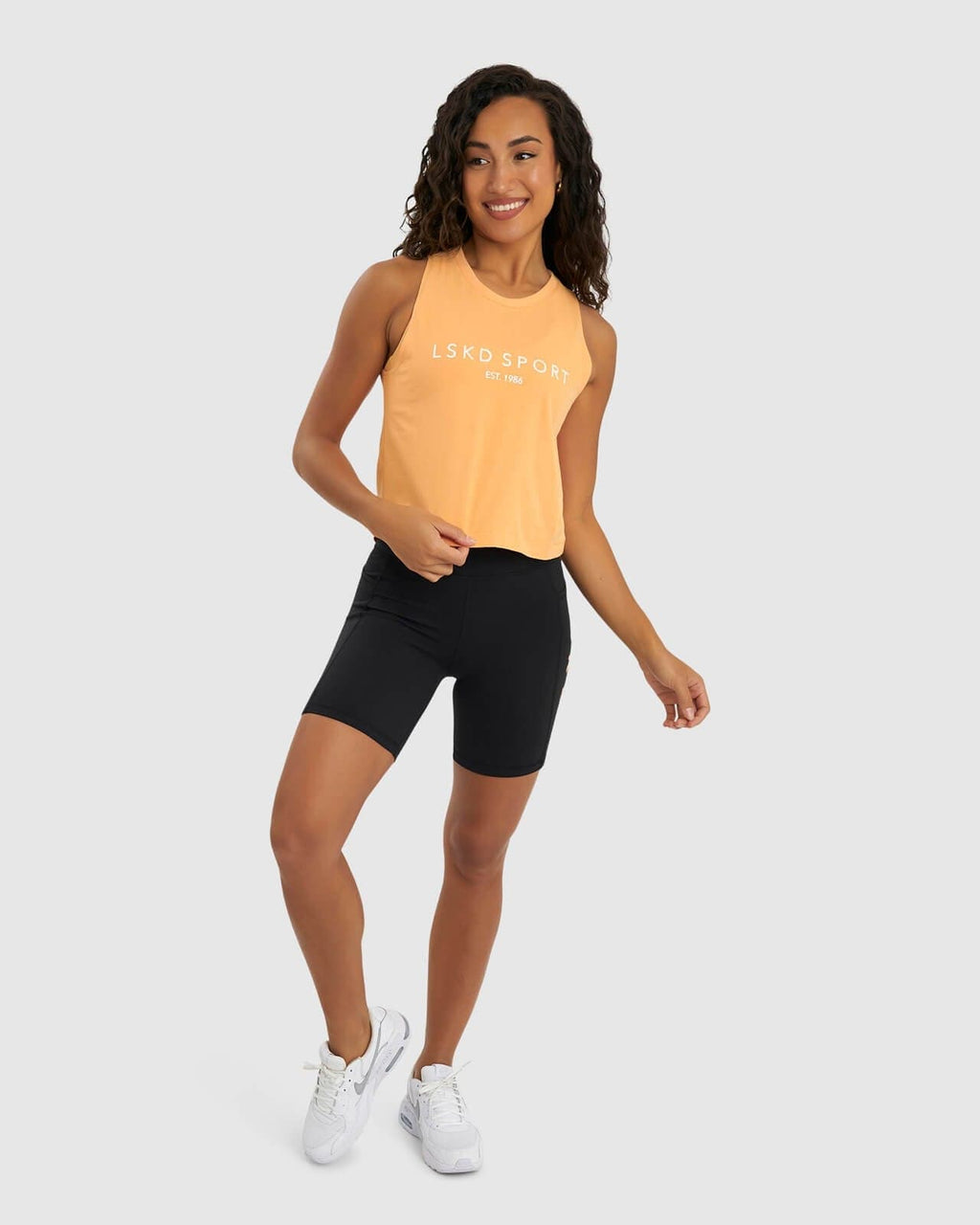 Model wearing Penalty Tank - Sherbet