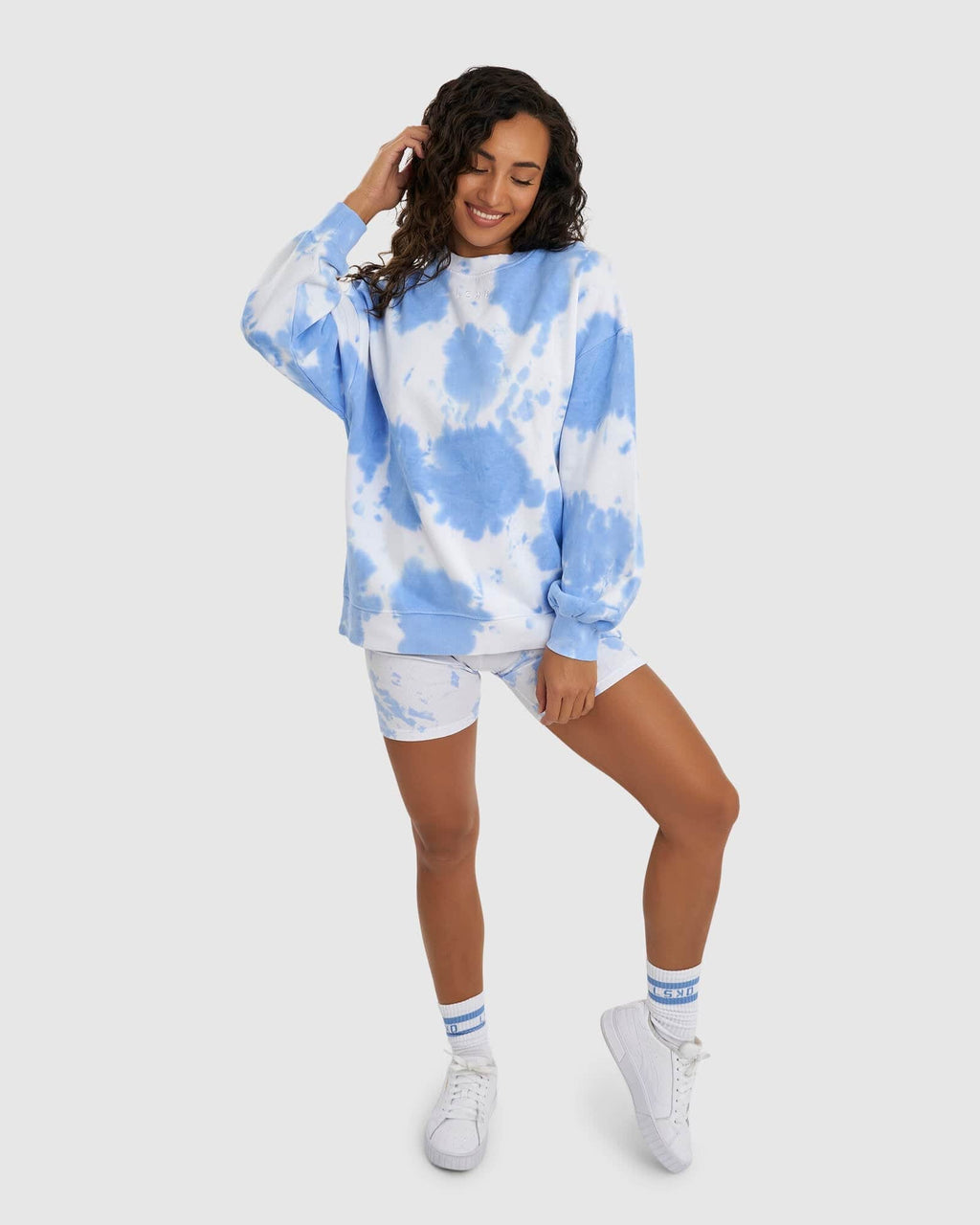 Model wearing Brook Oversized Sweater - Soft Blue Tie Dye