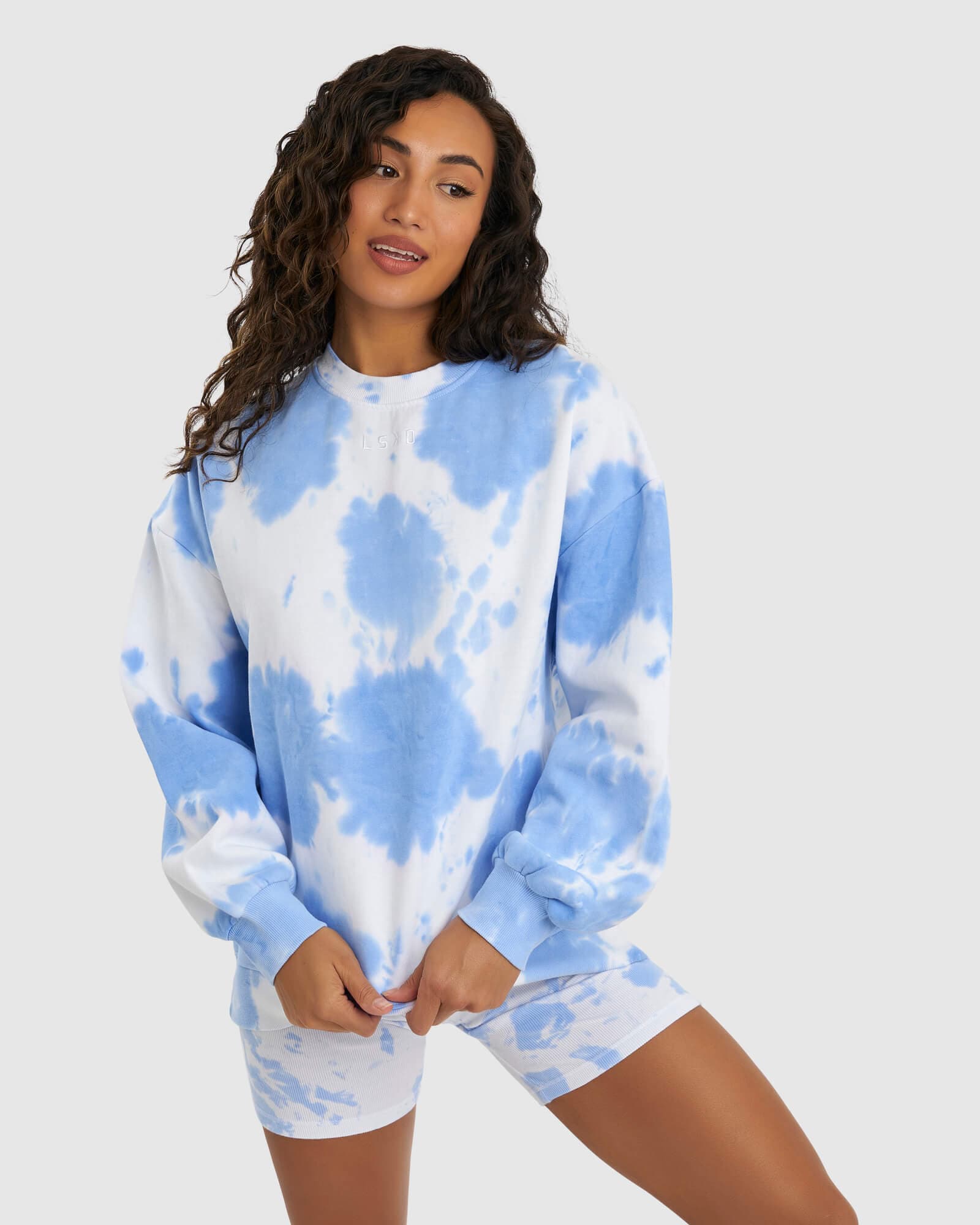 Model wearing Brook Oversized Sweater - Soft Blue Tie Dye