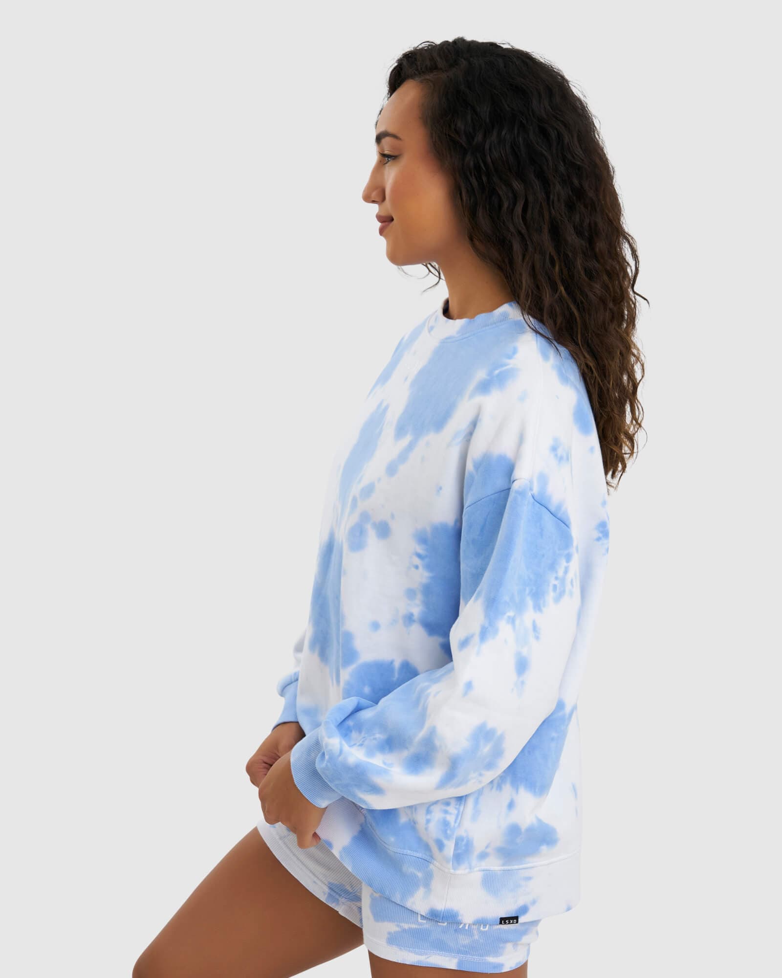 Model wearing Brook Oversized Sweater - Soft Blue Tie Dye