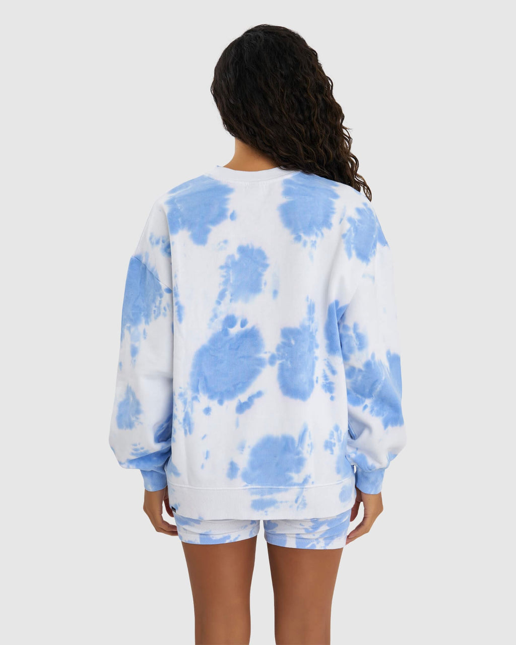 Model wearing Brook Oversized Sweater - Soft Blue Tie Dye