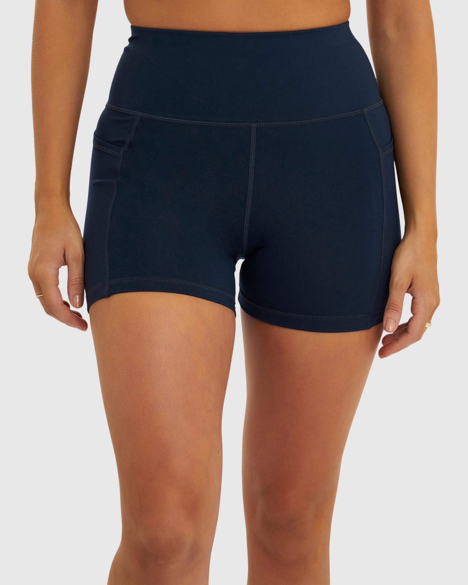 Model wearing Rep X-Short Tight Small Logo - Carbon