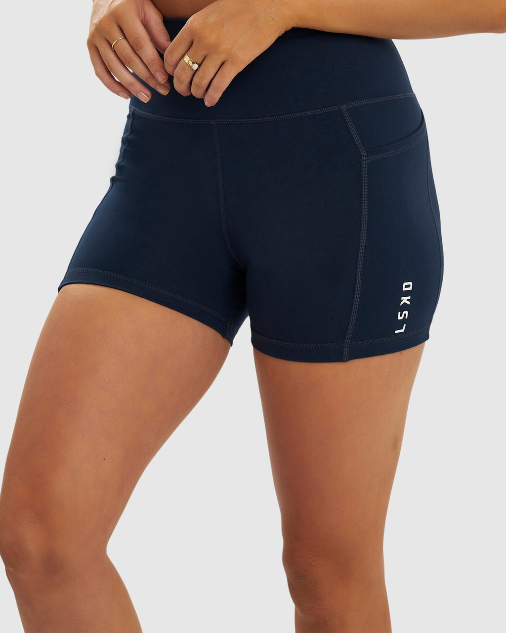 Model wearing Rep X-Short Tight Small Logo - Carbon