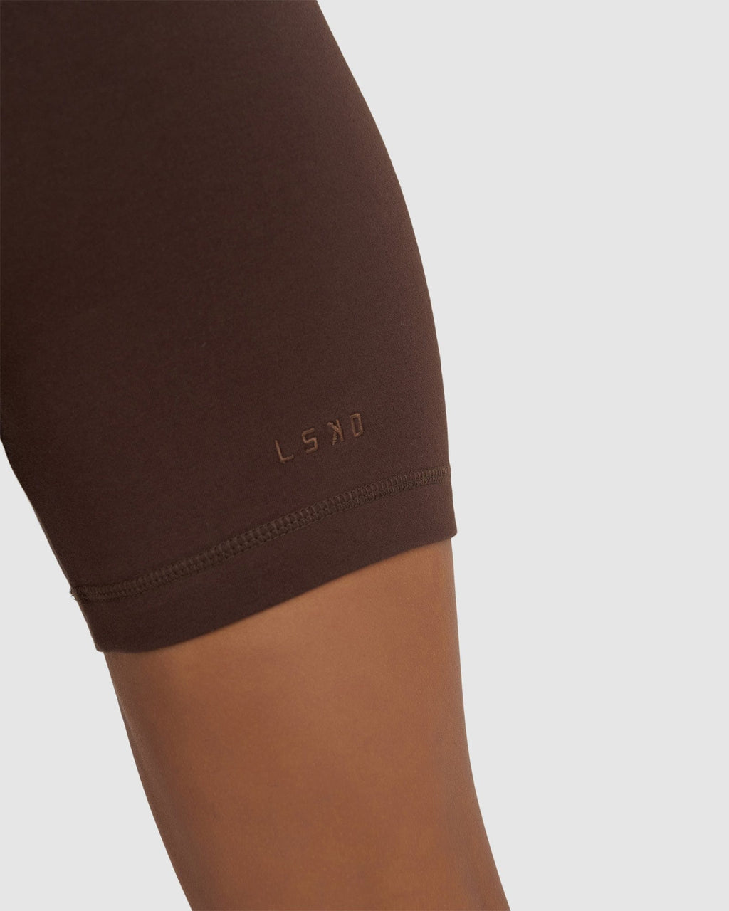 Model wearing Demi Bike Short - Walnut