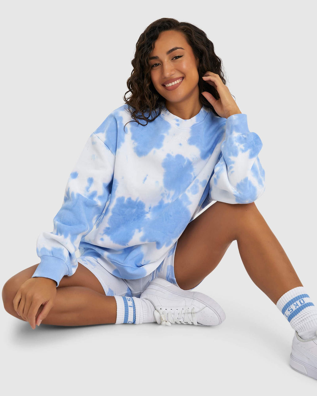 Model wearing Brook Oversized Sweater - Soft Blue Tie Dye