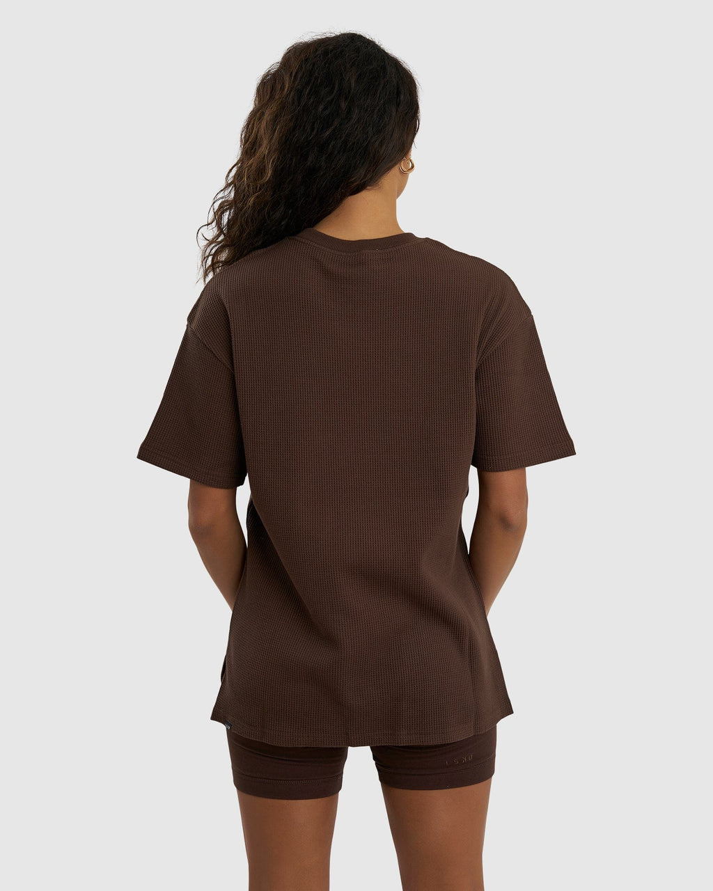 Model wearing Unisex Verse Waffle Tee - Walnut