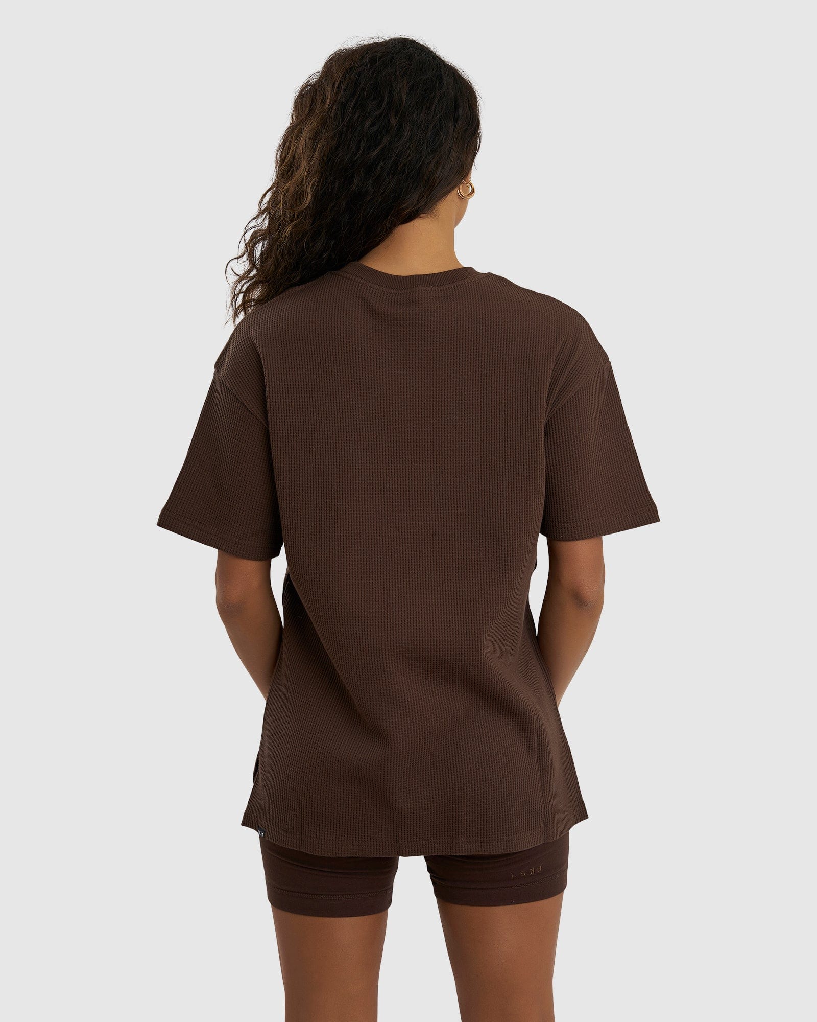 Model wearing Unisex Verse Waffle Tee - Walnut