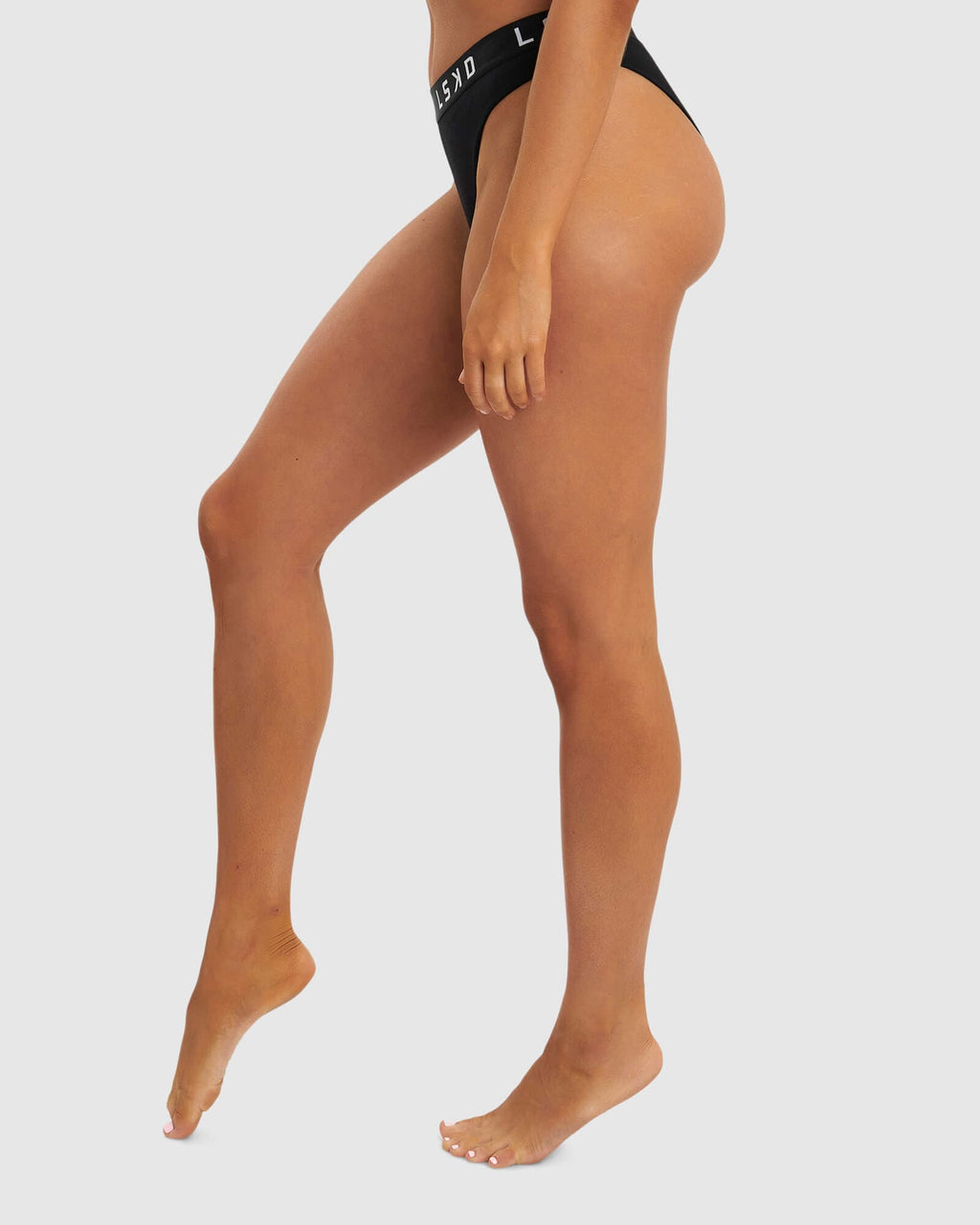 Model wearing Gigi Bikini Brief - Black