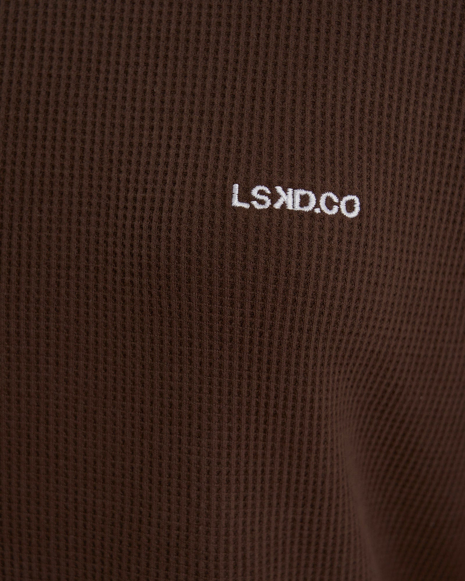 Model wearing Unisex Verse Waffle Tee - Walnut