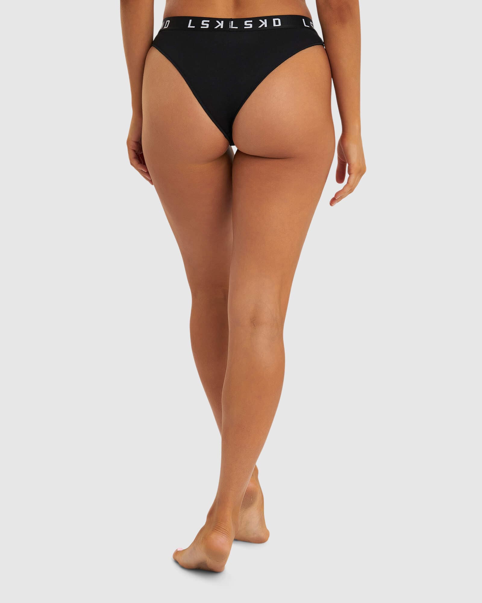 Model wearing Gigi Bikini Brief - Black