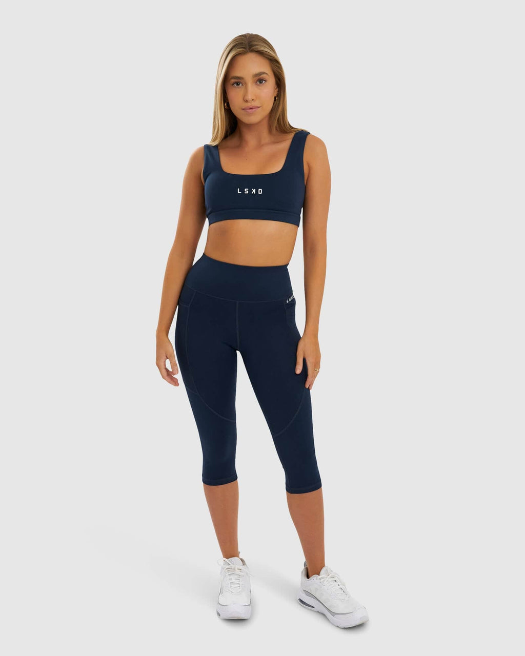 Model wearing Rep 3/4 Length Tight Small Logo - Carbon