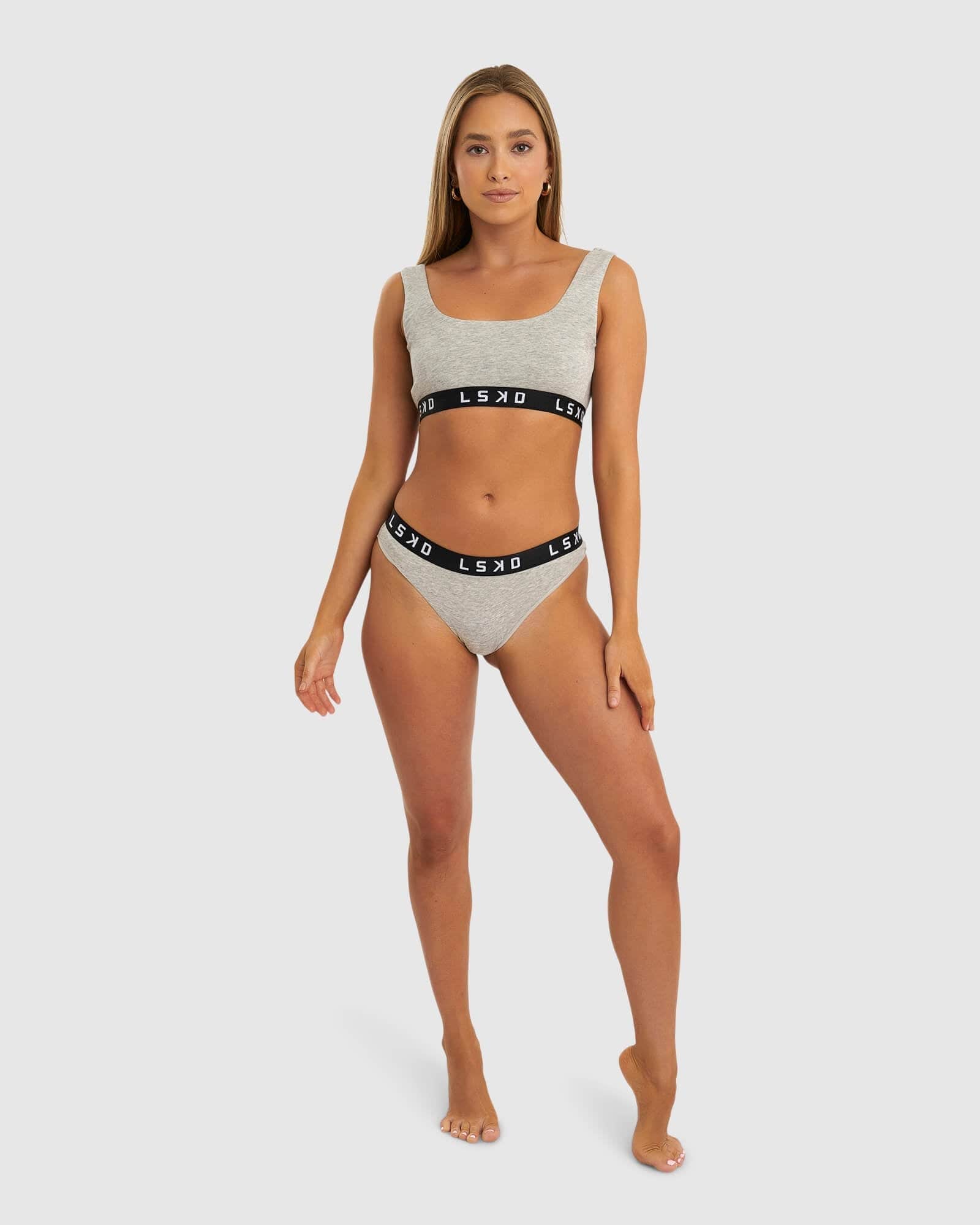 Model wearing Gigi Bikini Brief - Lt Grey Marl