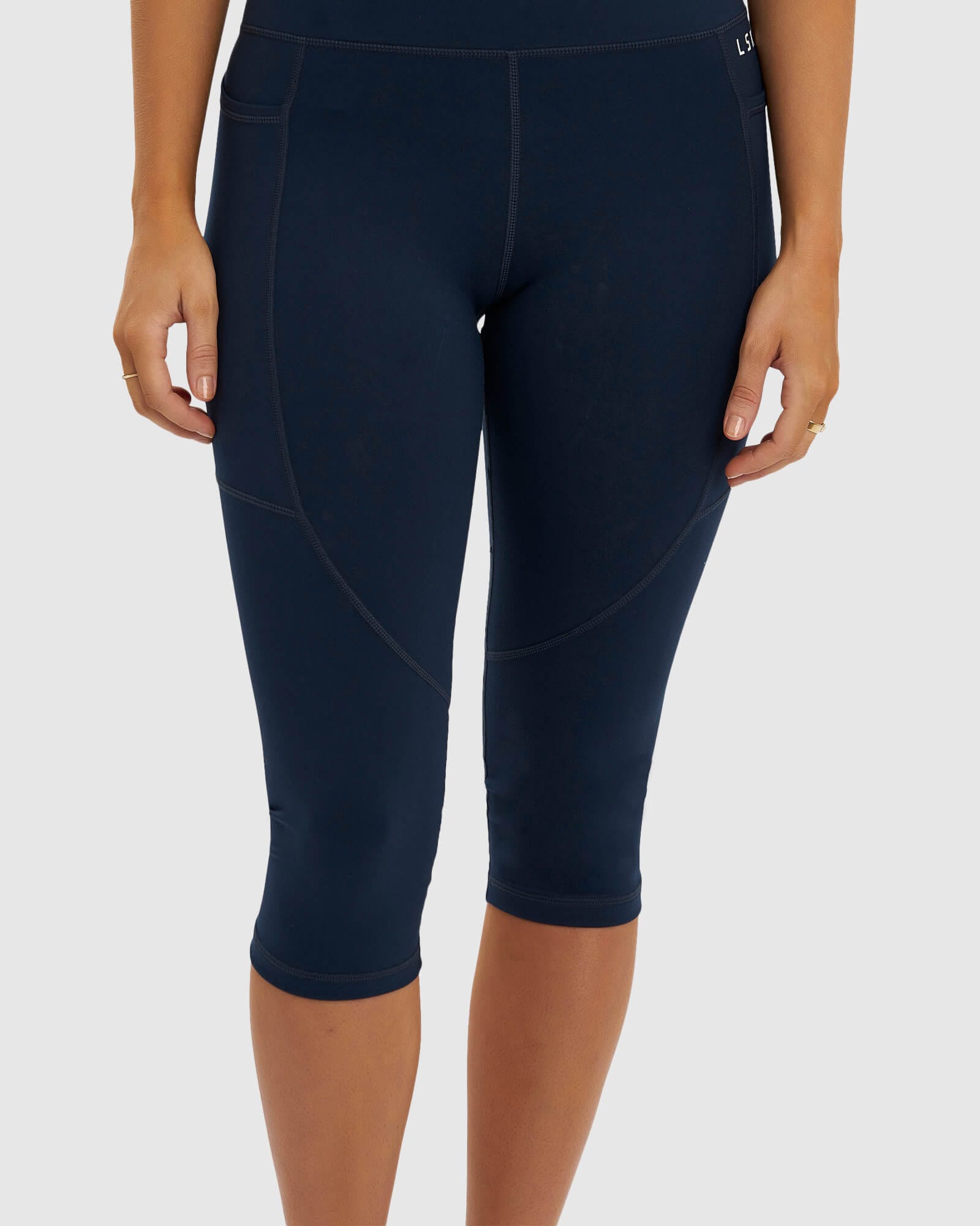 Model wearing Rep 3/4 Length Tight Small Logo - Carbon