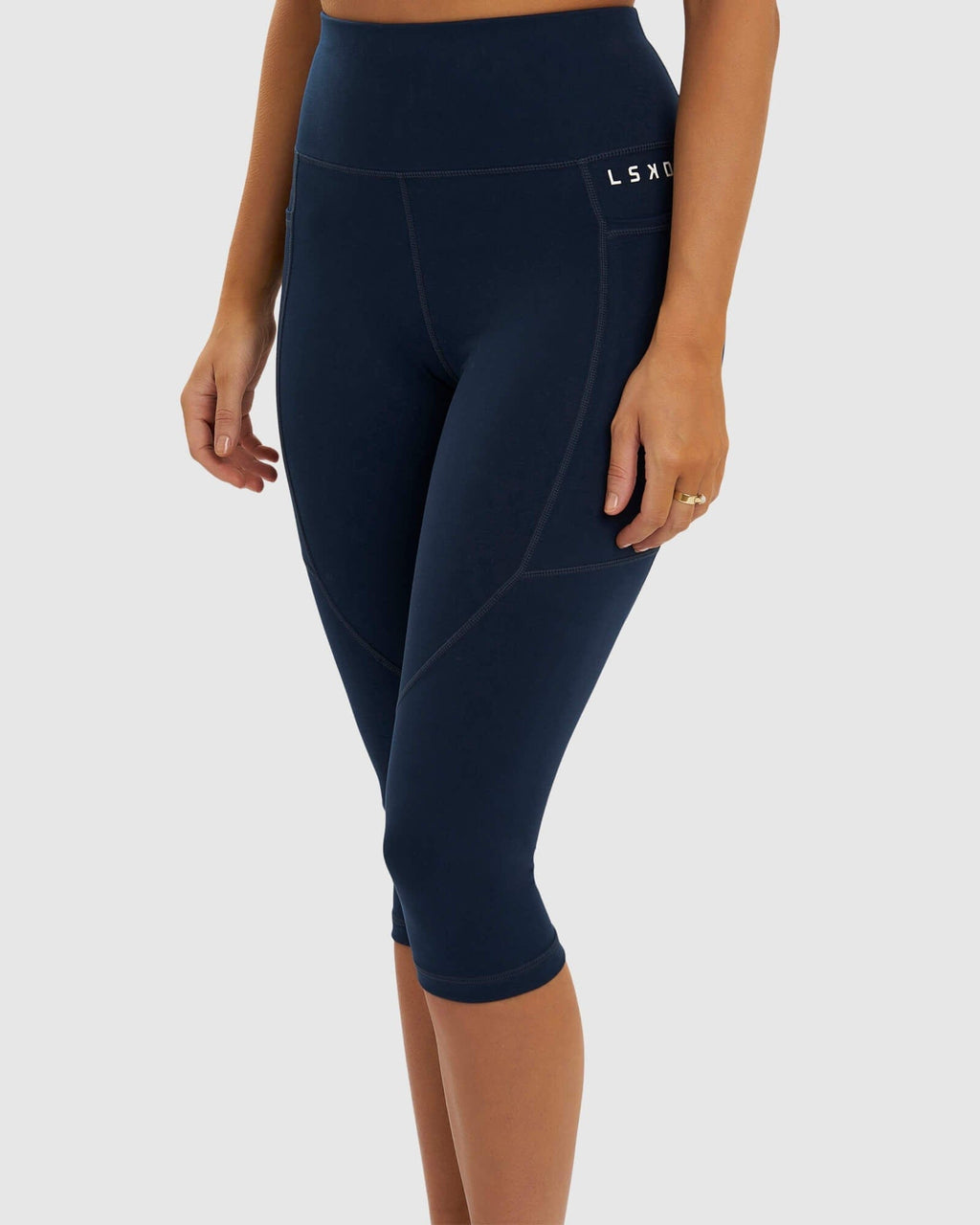 Model wearing Rep 3/4 Length Tight Small Logo - Carbon