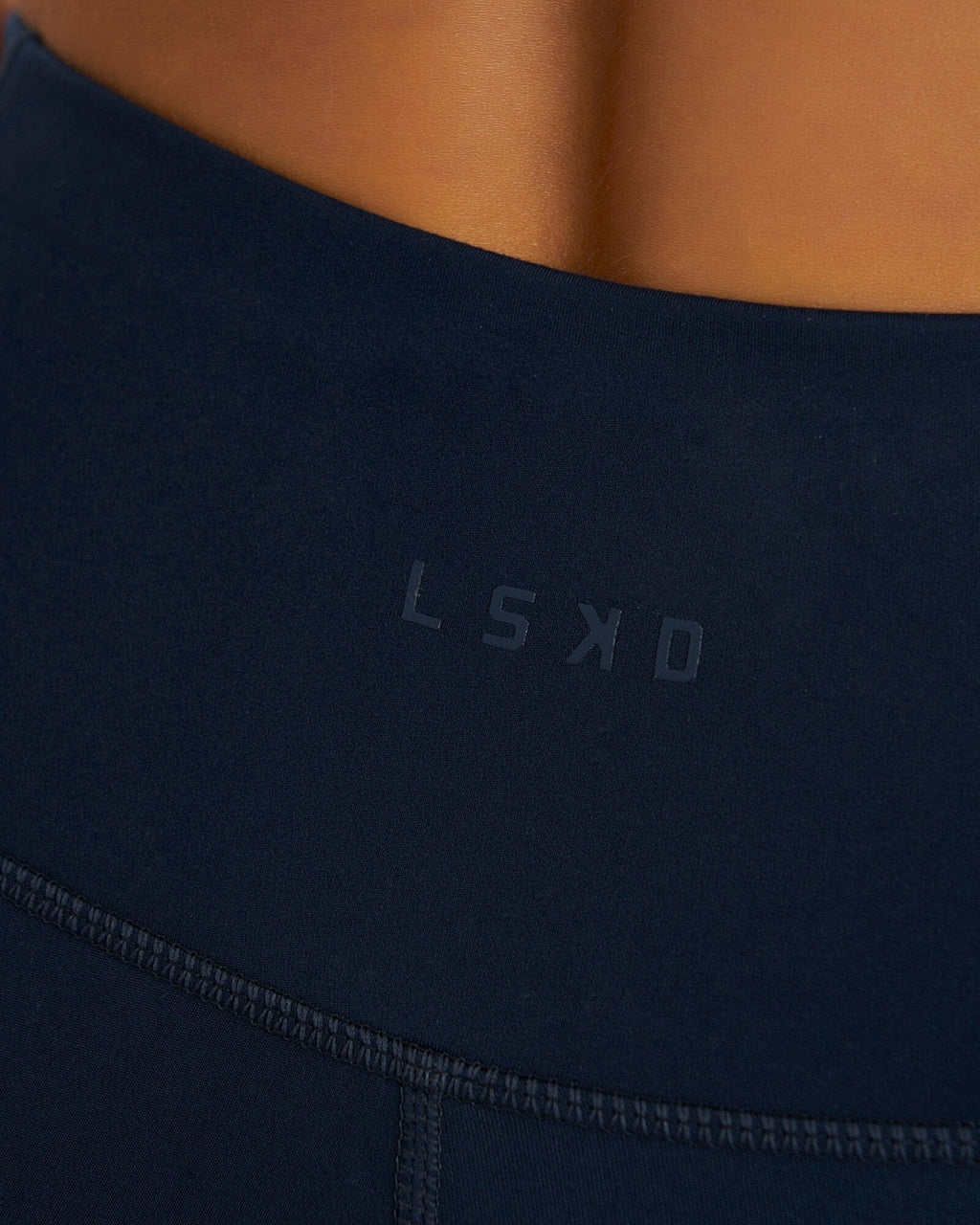 Model wearing Rep 3/4 Length Tight Small Logo - Carbon