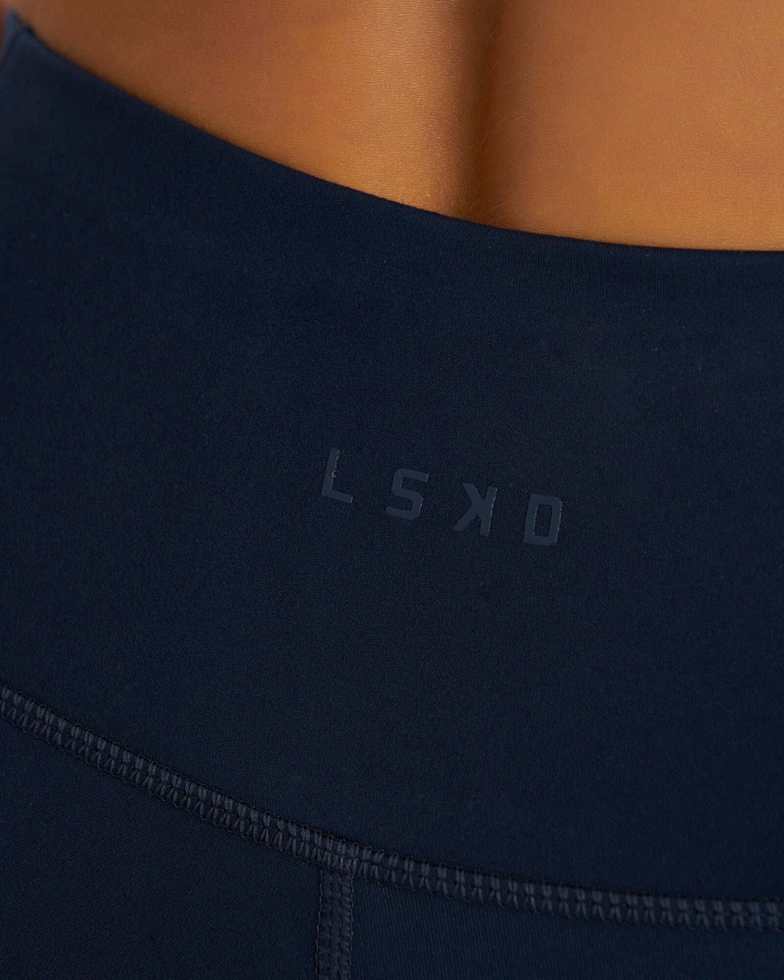 Model wearing Rep 3/4 Length Tight Small Logo - Carbon