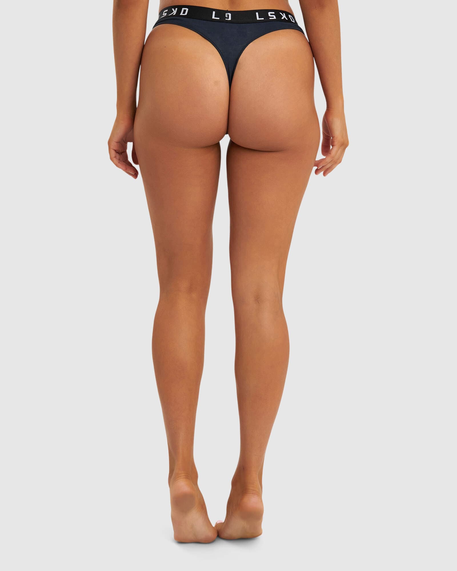 Model wearing Gigi-String Brief - Carbon