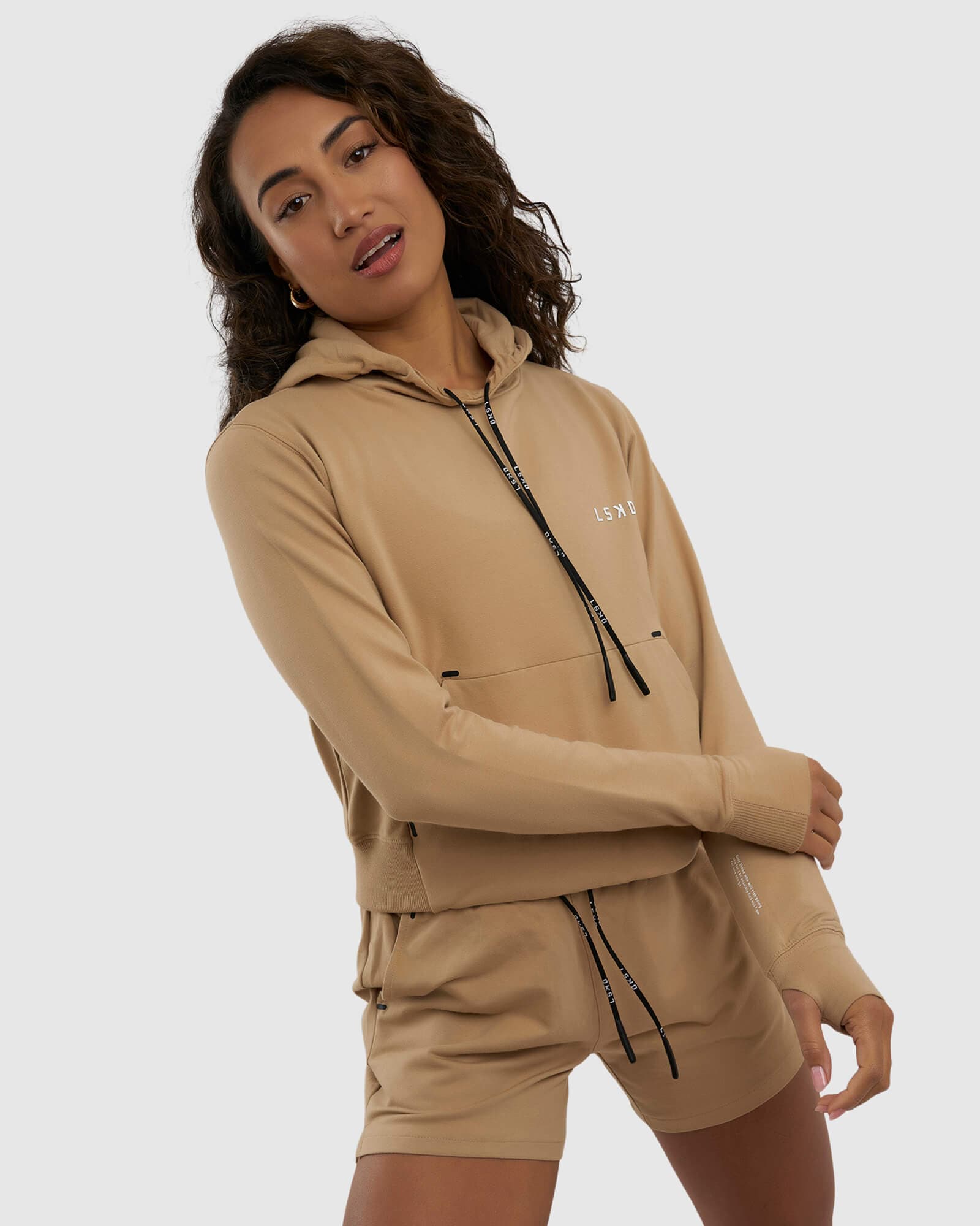 Model wearing Grind Hoodie - Almond