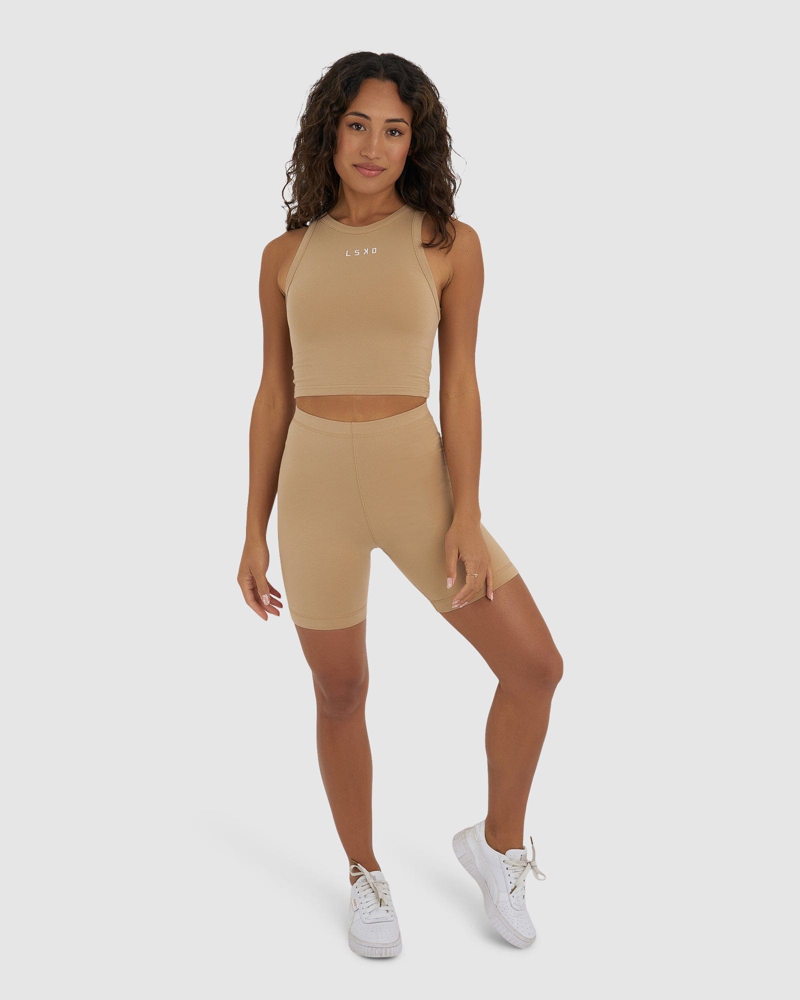 Model wearing Demi Bike Short - Almond