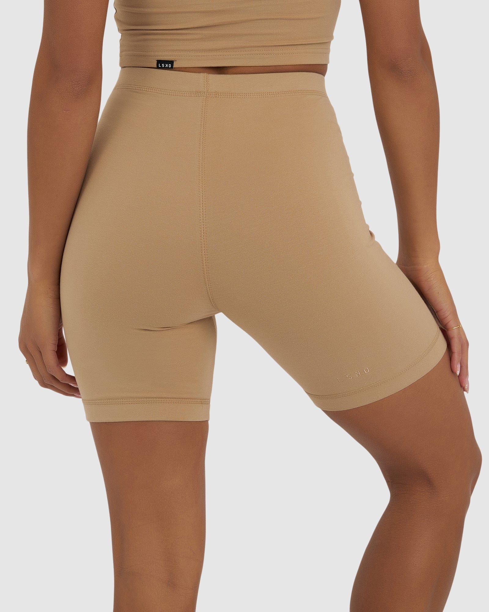 Model wearing Demi Bike Short - Almond