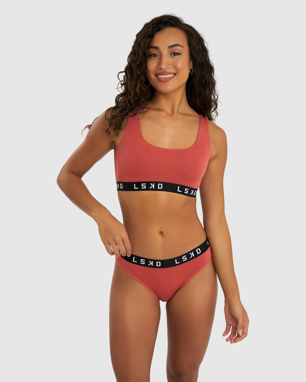 Model wearing Gigi Lounge Bra - Hot Tamale