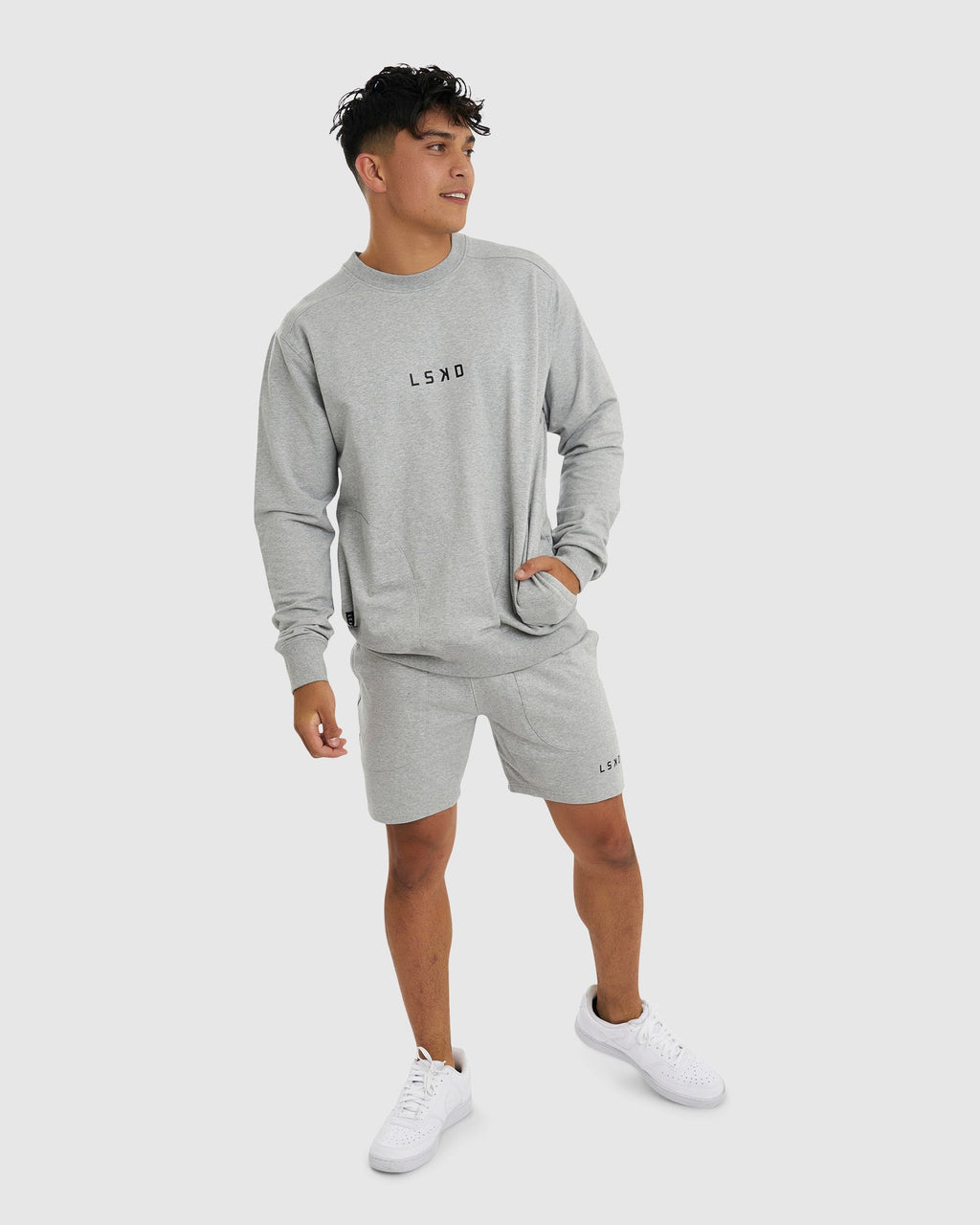 Model wearing Unisex Routine Sweater - Lt Grey Marl