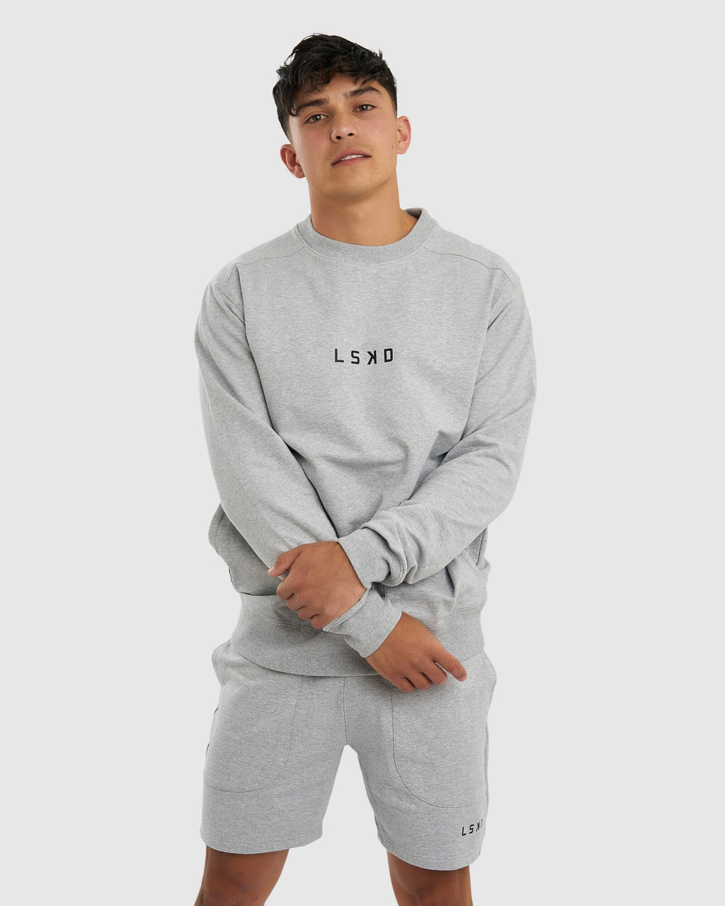 Model wearing Unisex Routine Sweater - Lt Grey Marl