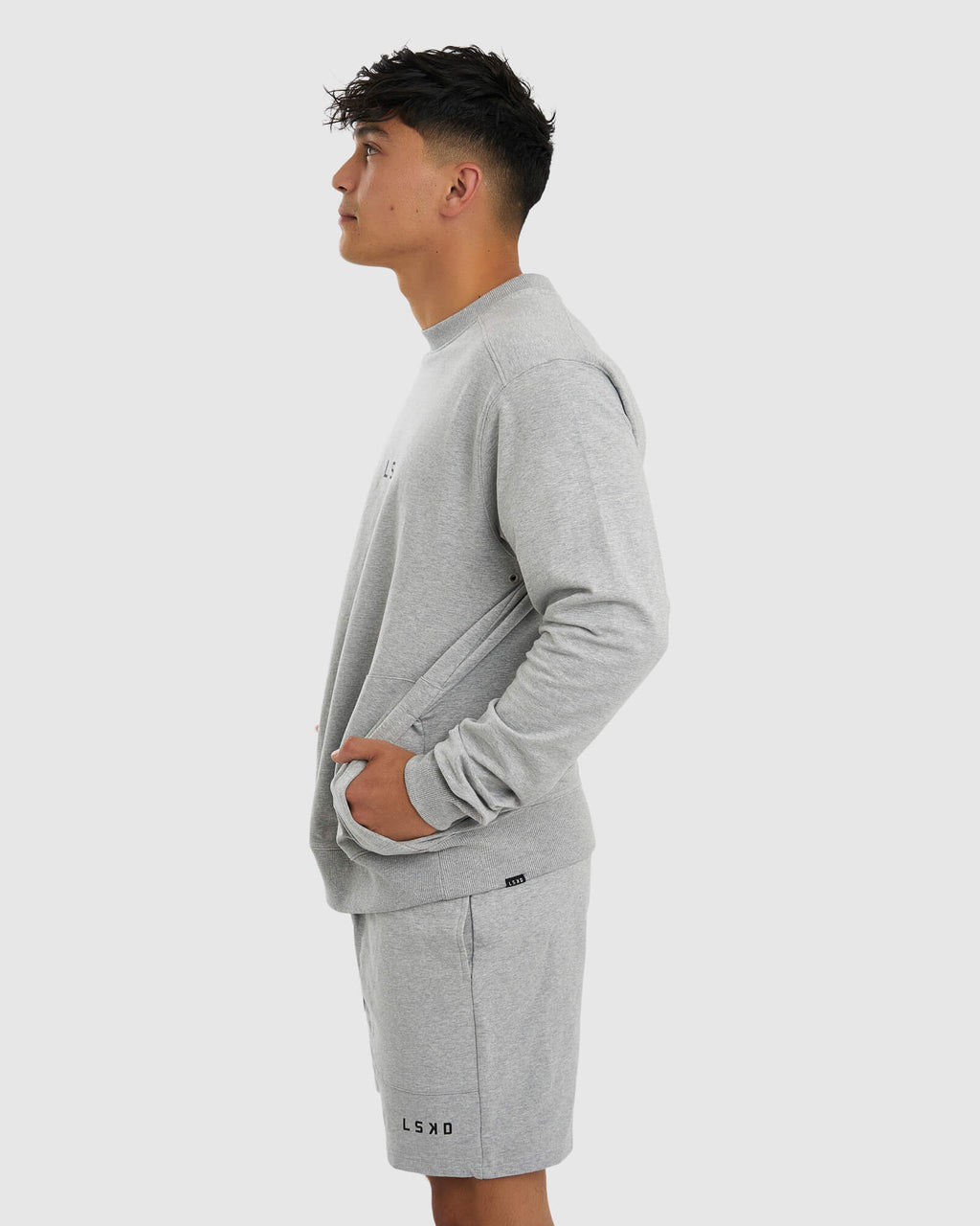 Model wearing Unisex Routine Sweater - Lt Grey Marl