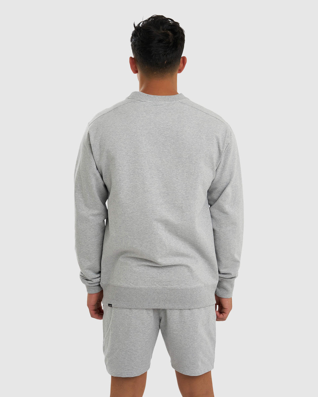 Model wearing Unisex Routine Sweater - Lt Grey Marl