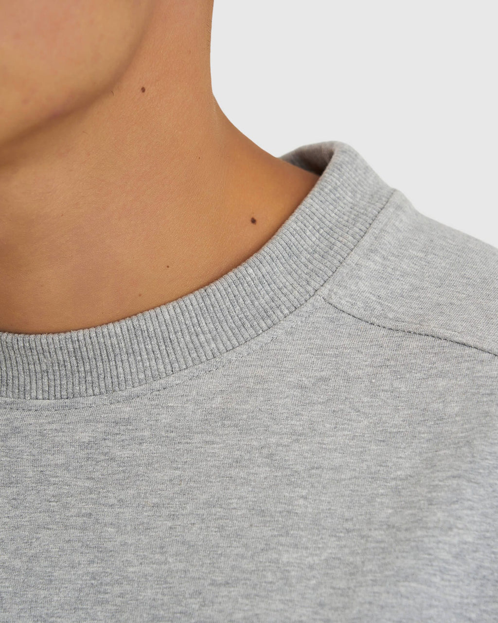 Model wearing Unisex Routine Sweater - Lt Grey Marl