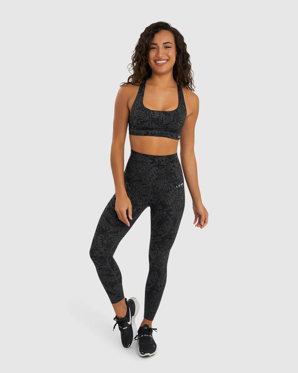 Model wearing Base Sports Bra - Black Mamba