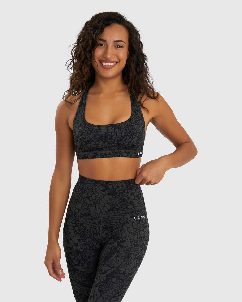 Model wearing Base Sports Bra - Black Mamba