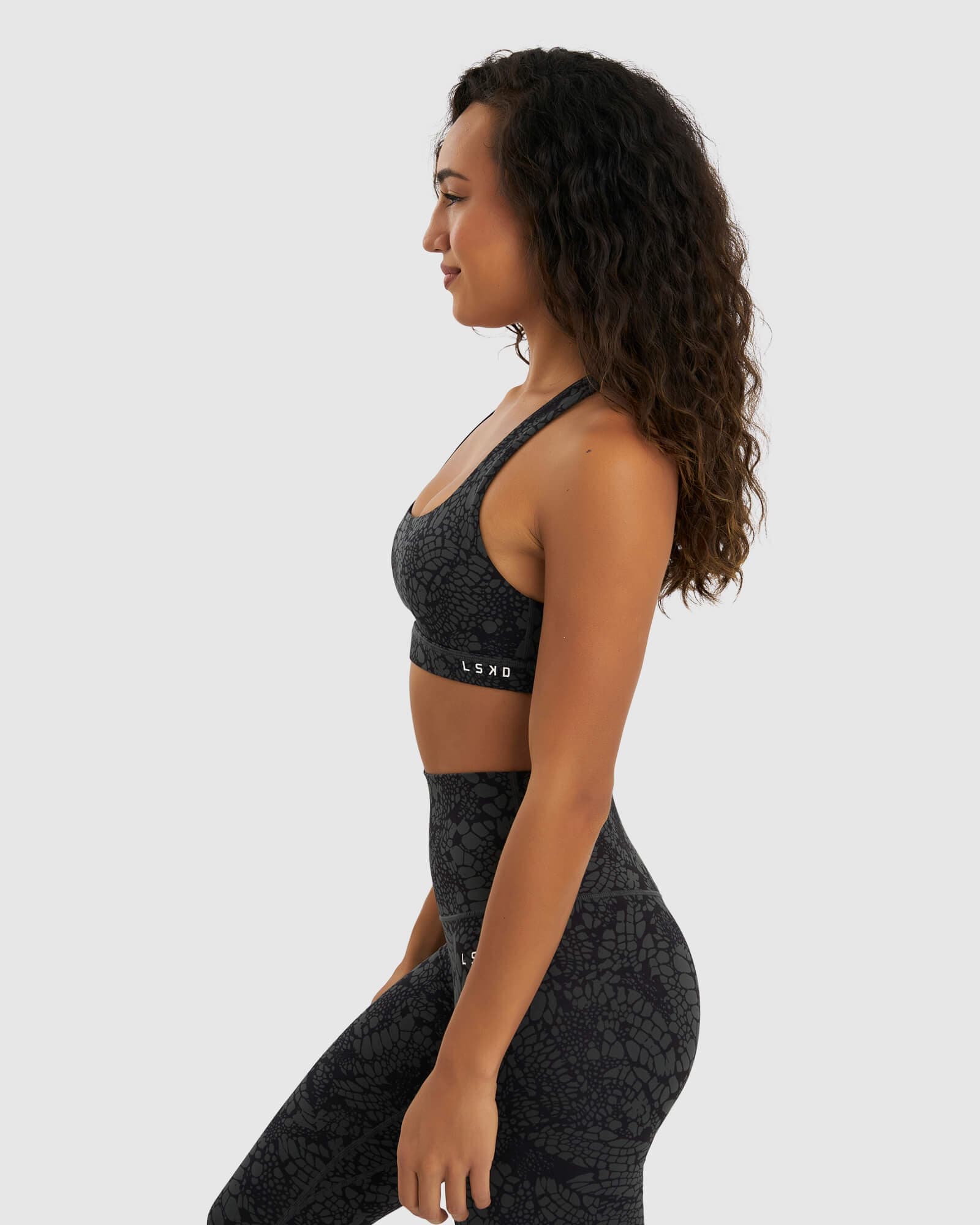 Model wearing Base Sports Bra - Black Mamba