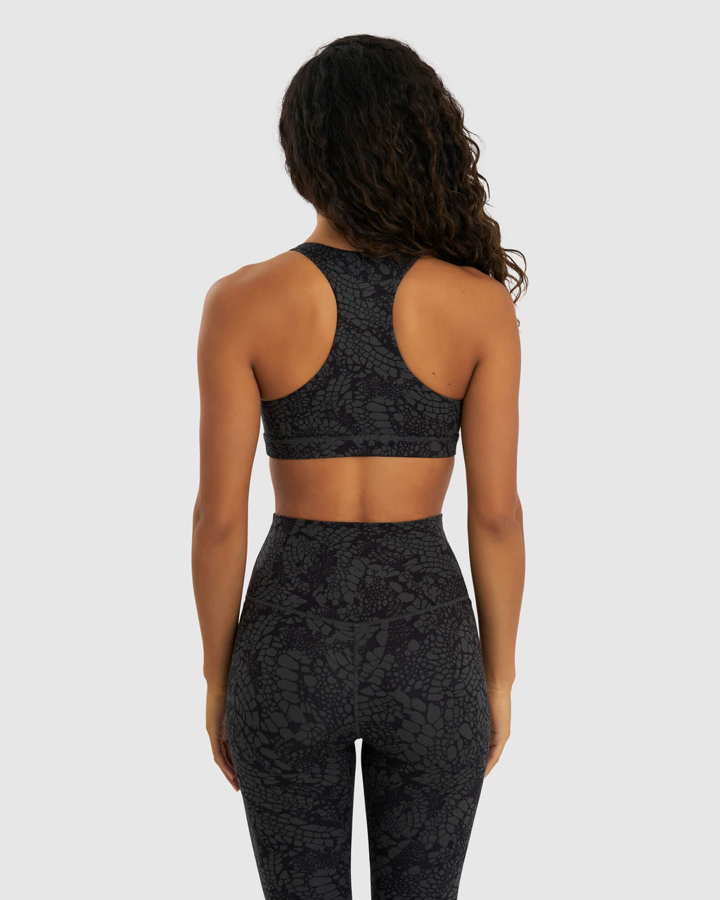 Model wearing Base Sports Bra - Black Mamba