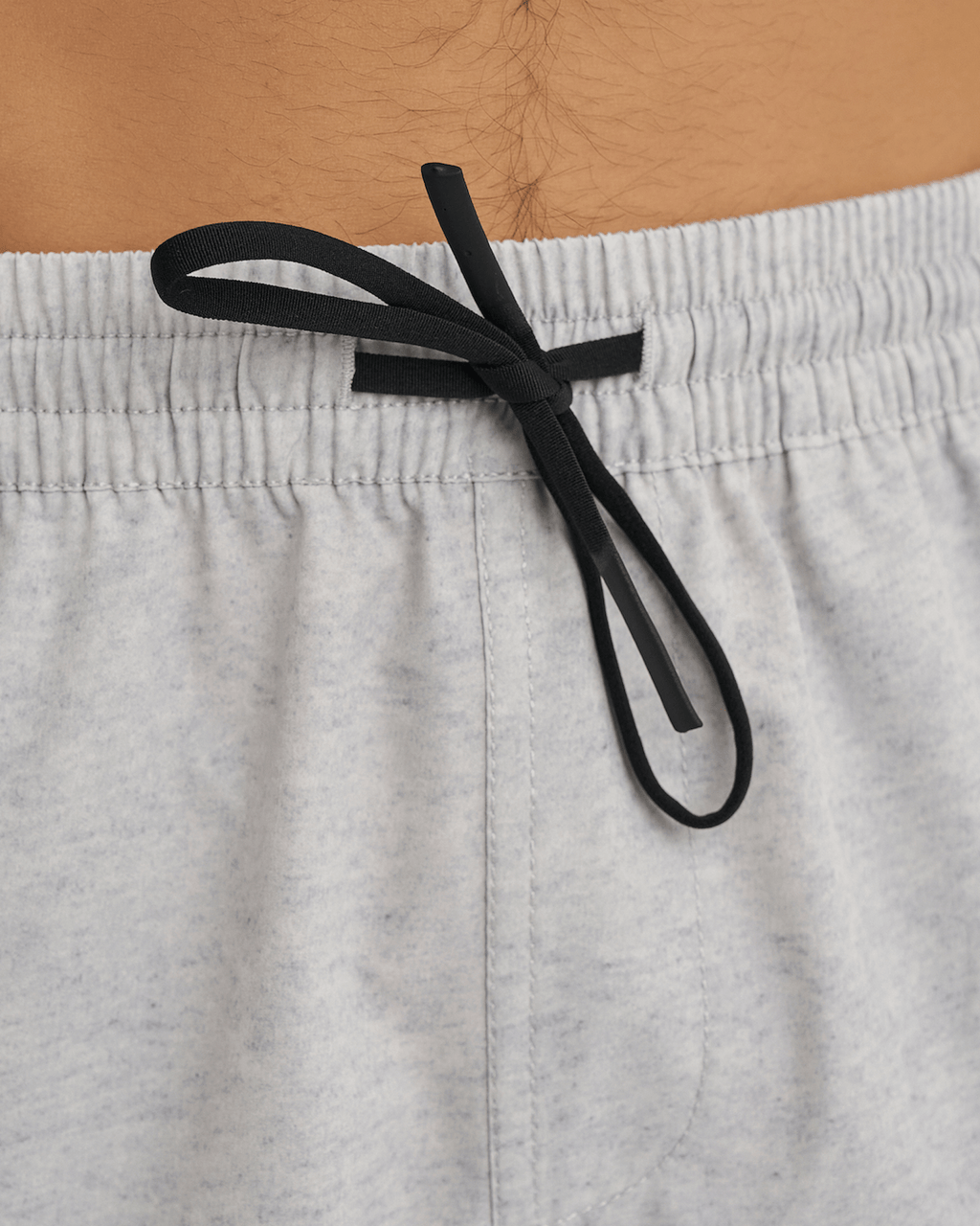 Model wearing Rep 7" Performance Short - Lt Grey Marl