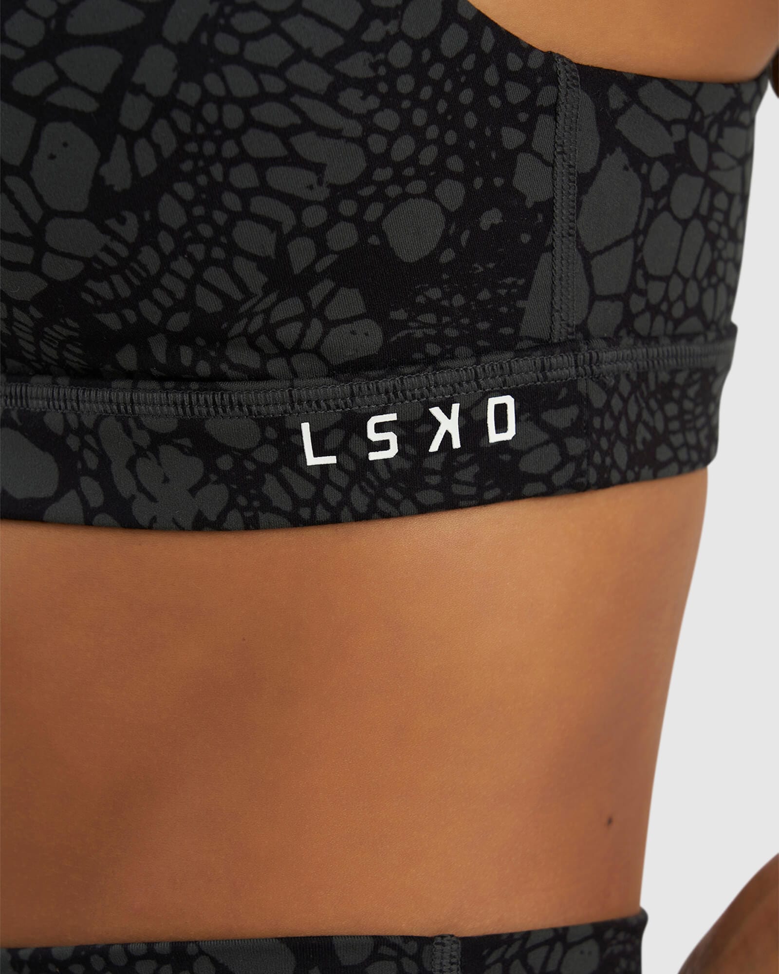 Model wearing Base Sports Bra - Black Mamba