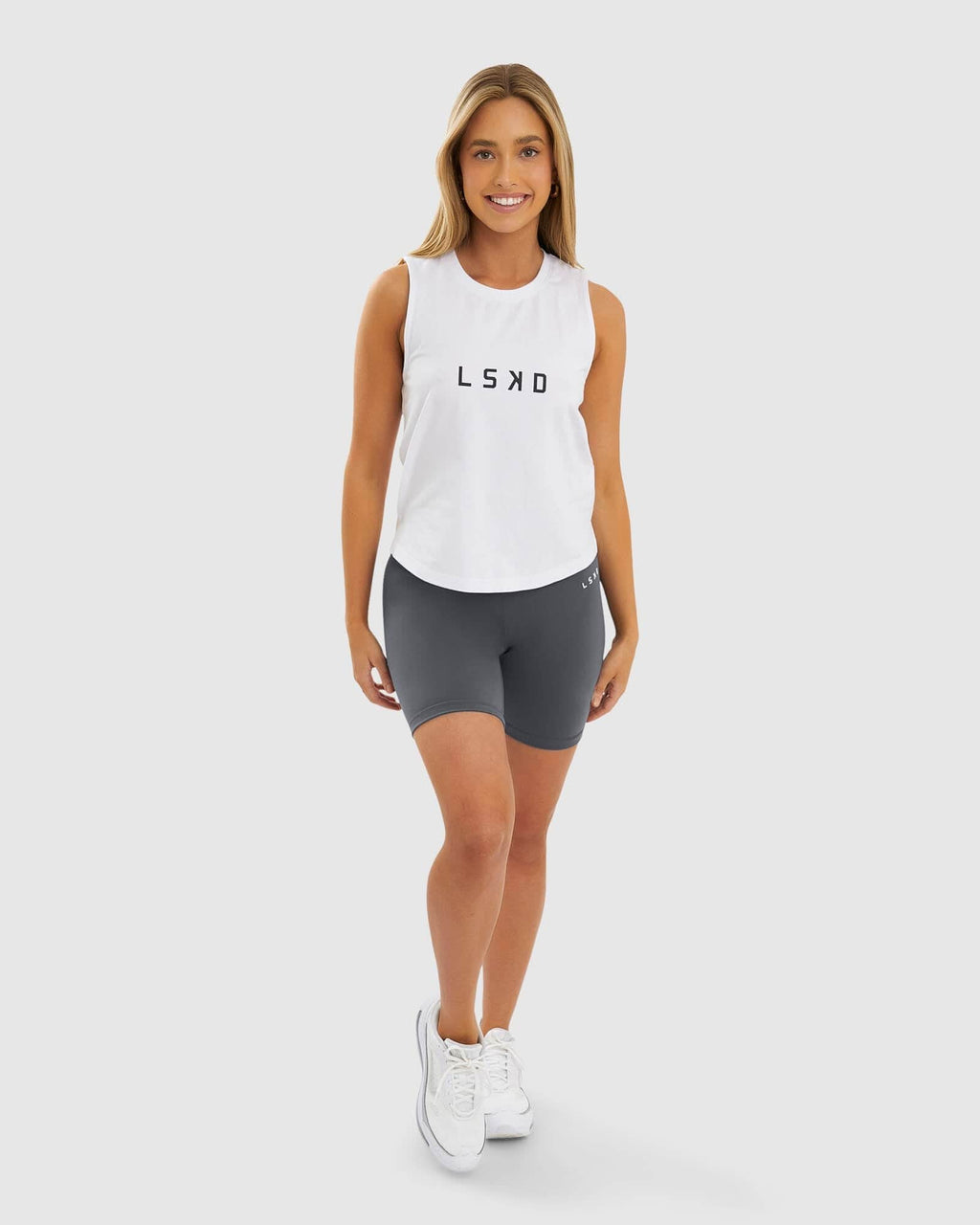 Model wearing Base Mid Short Tight - Iron