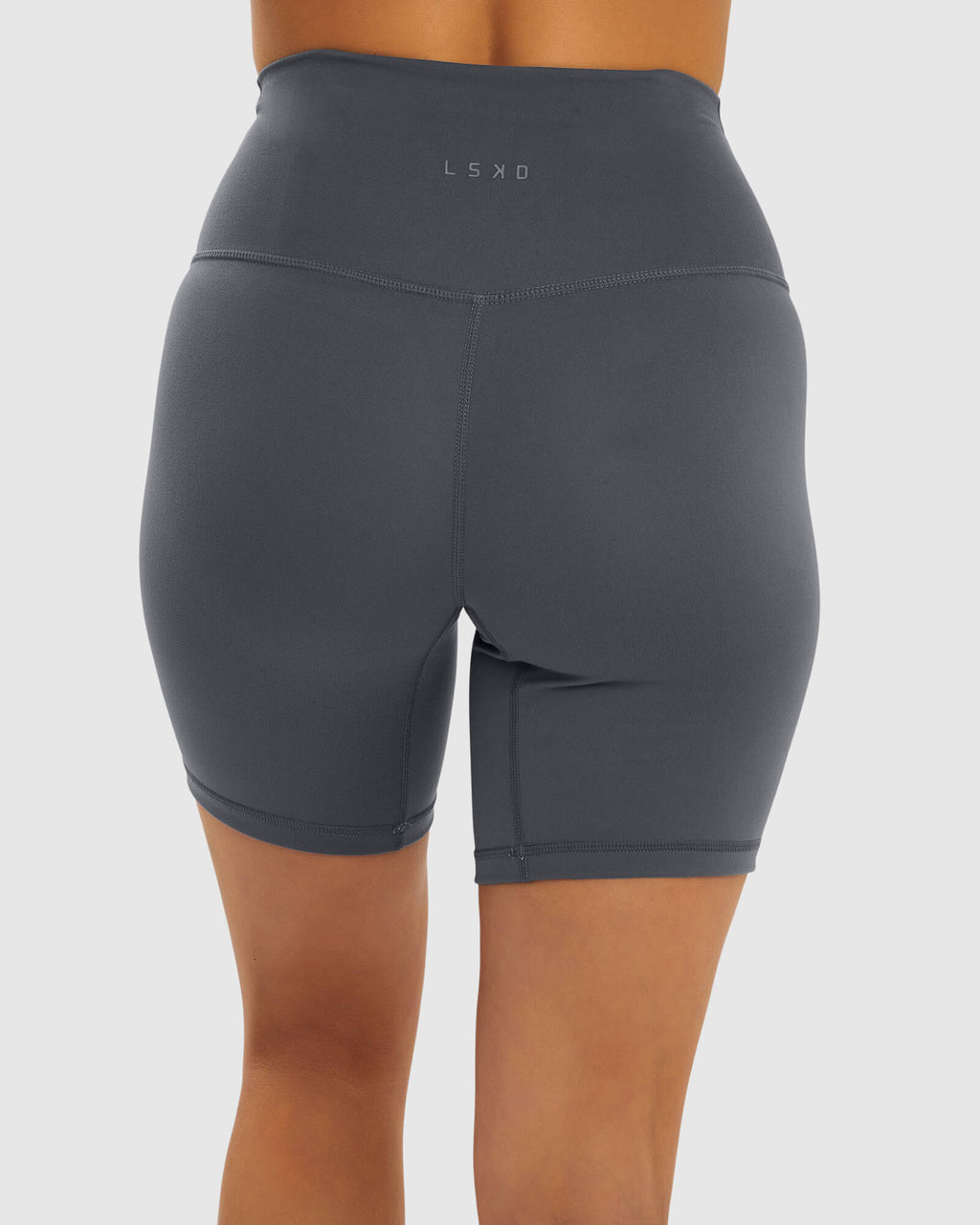 Model wearing Base Mid Short Tight - Iron