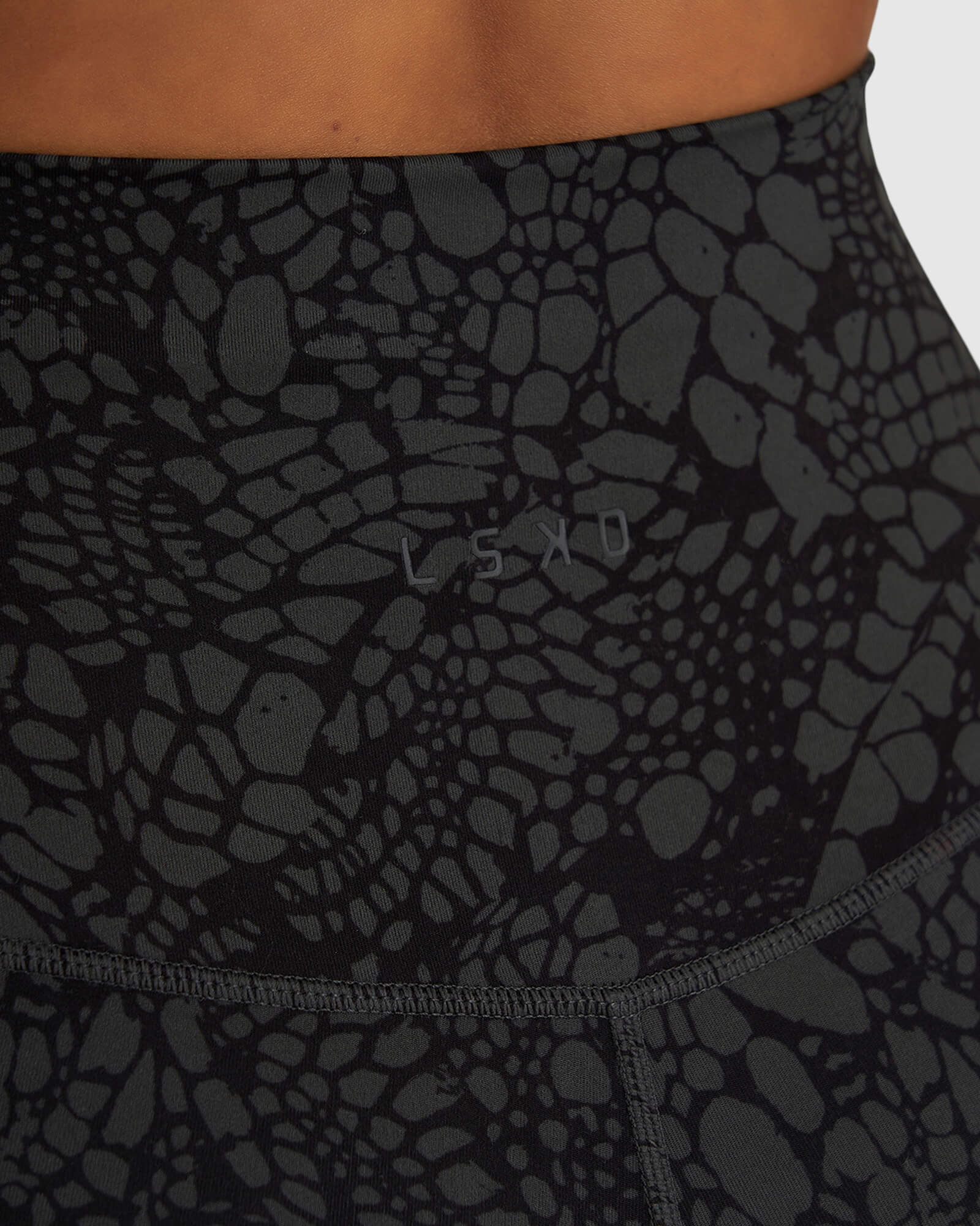 Model wearing Base Mid Short Tight - Black Mamba