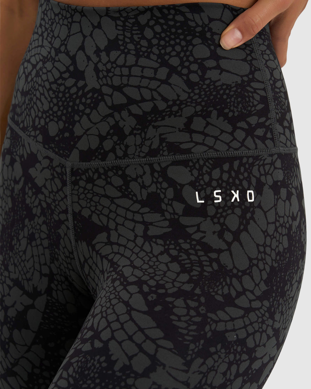 Model wearing Base Mid Short Tight - Black Mamba