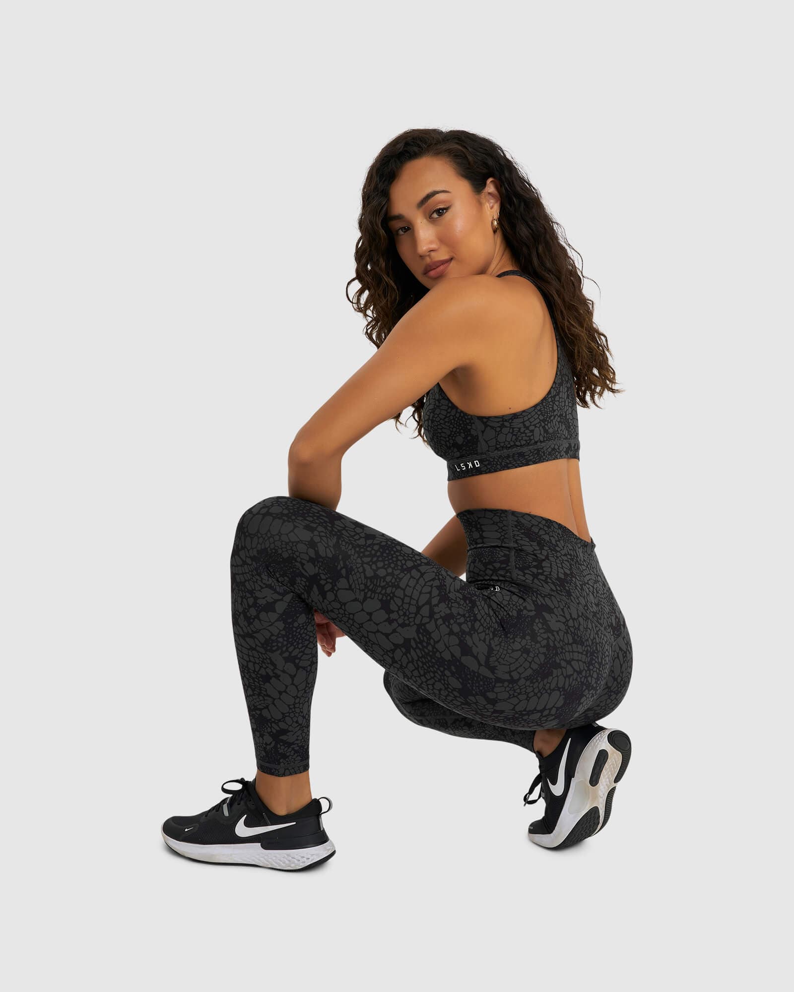 Model wearing Base Full Length Tight - Black Mamba