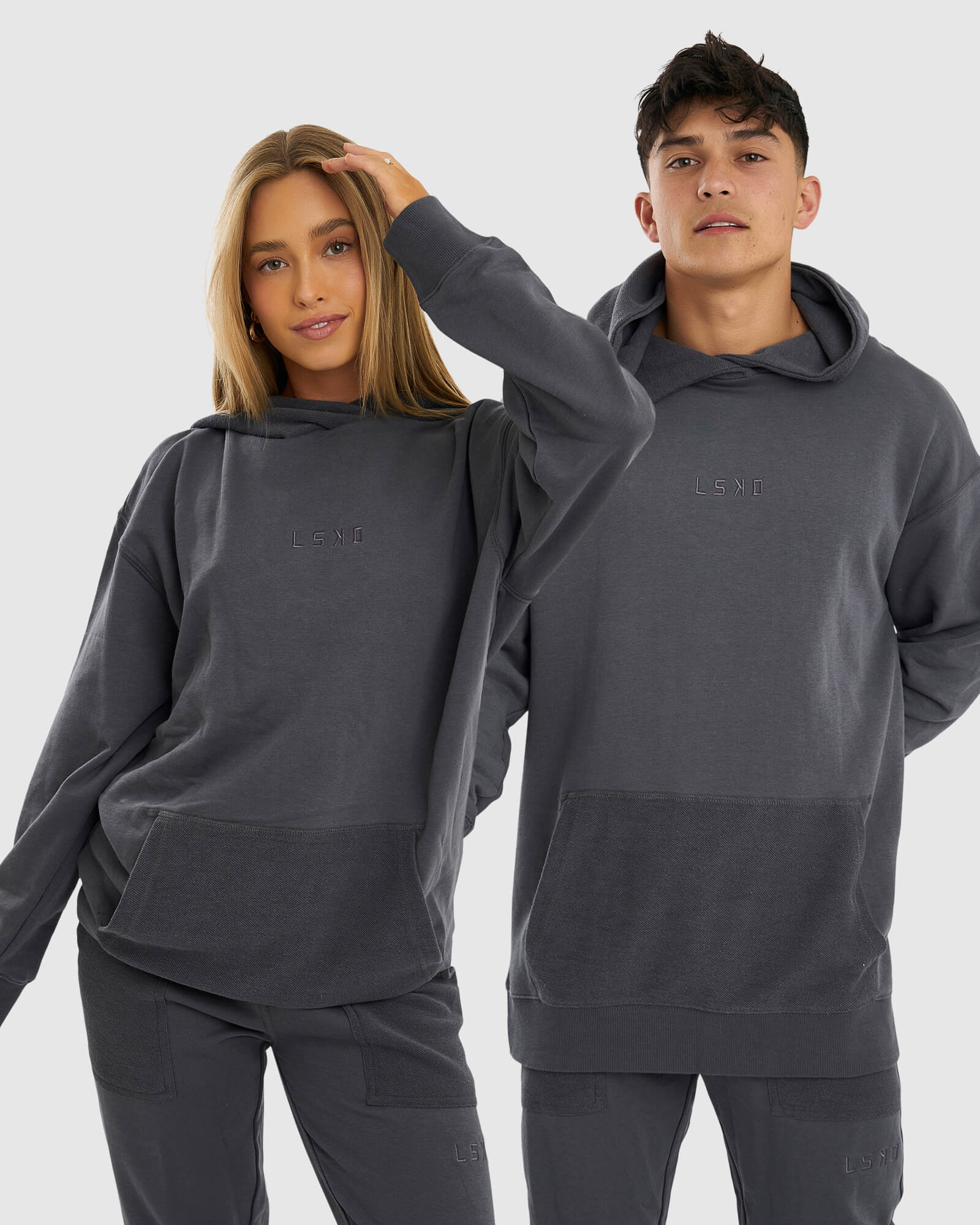 Model wearing Unisex Locker Room Hoodie Oversize - Iron