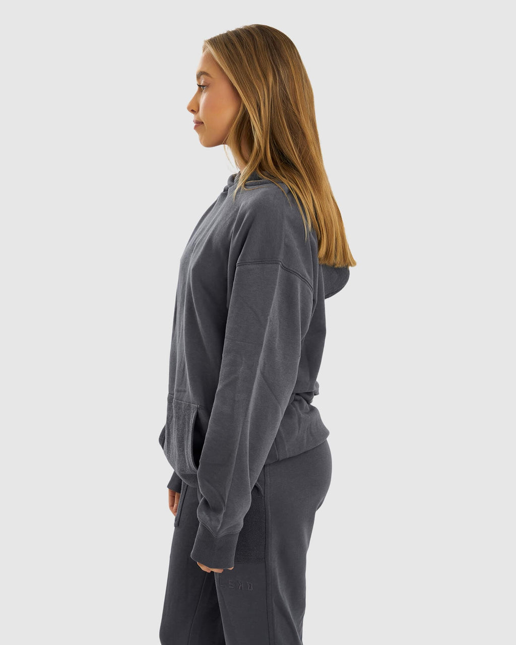 Model wearing Unisex Locker Room Hoodie Oversize - Iron