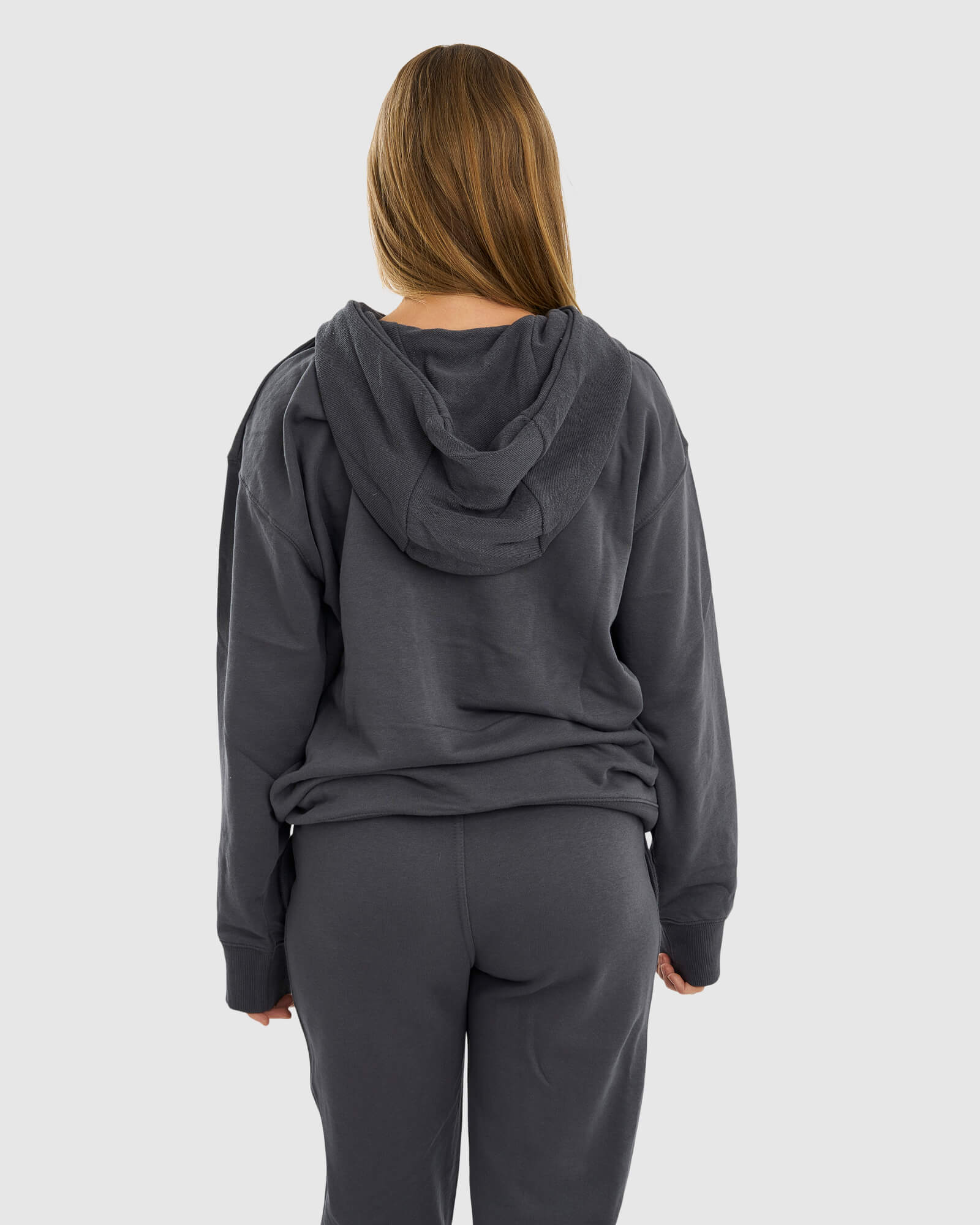 Model wearing Unisex Locker Room Hoodie Oversize - Iron
