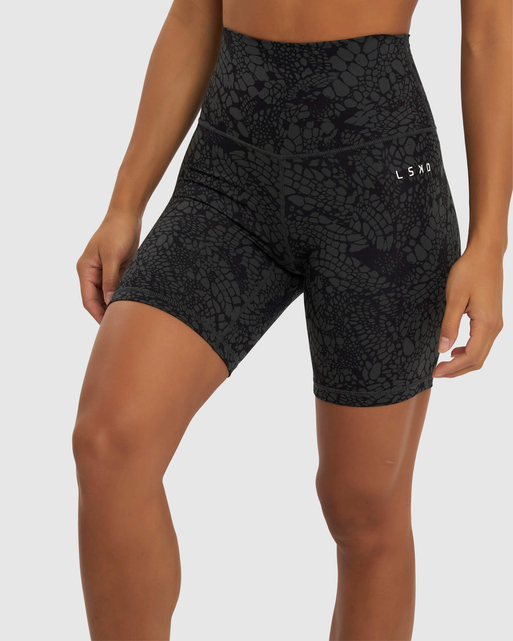 Model wearing Base Mid Short Tight - Black Mamba