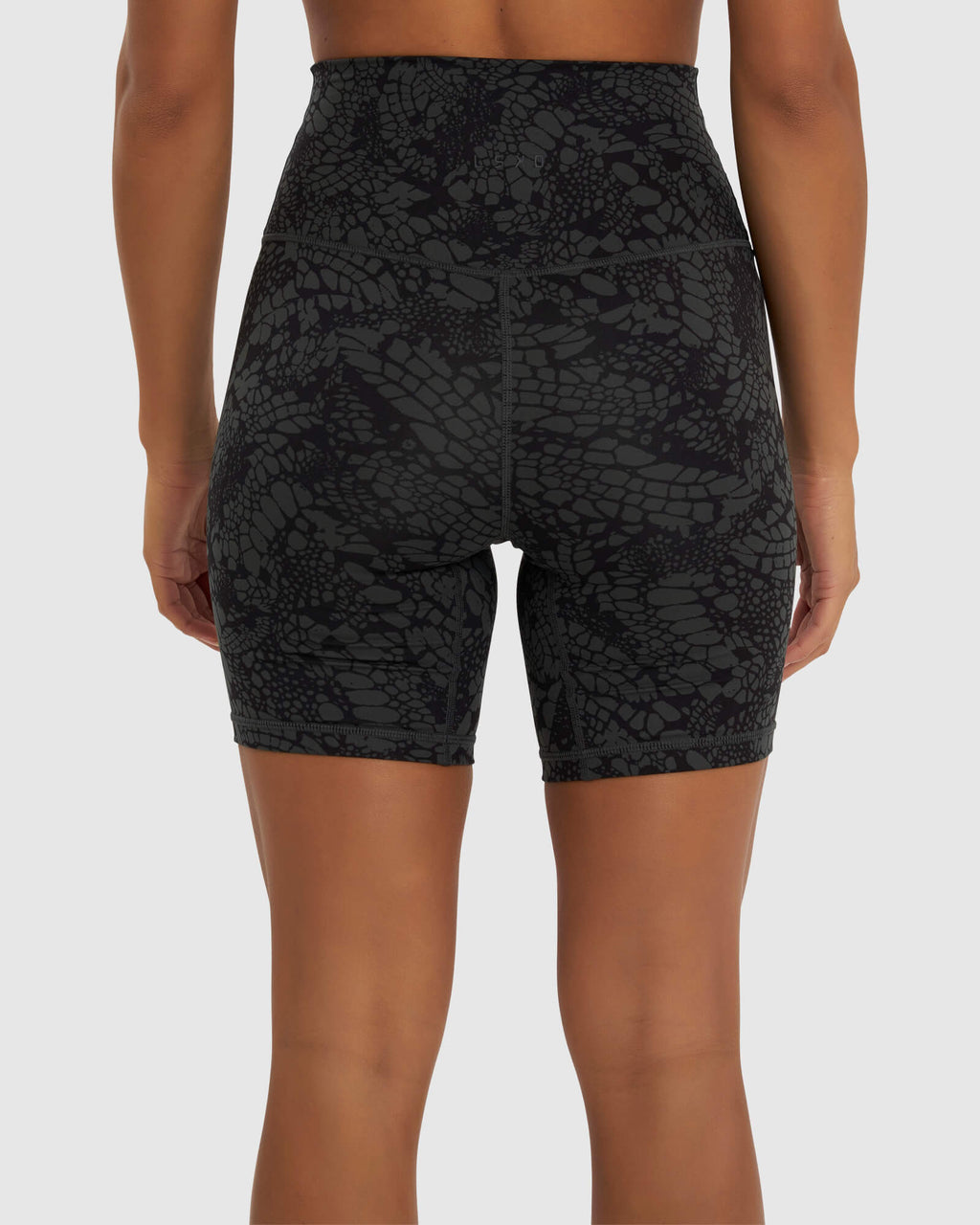 Model wearing Base Mid Short Tight - Black Mamba