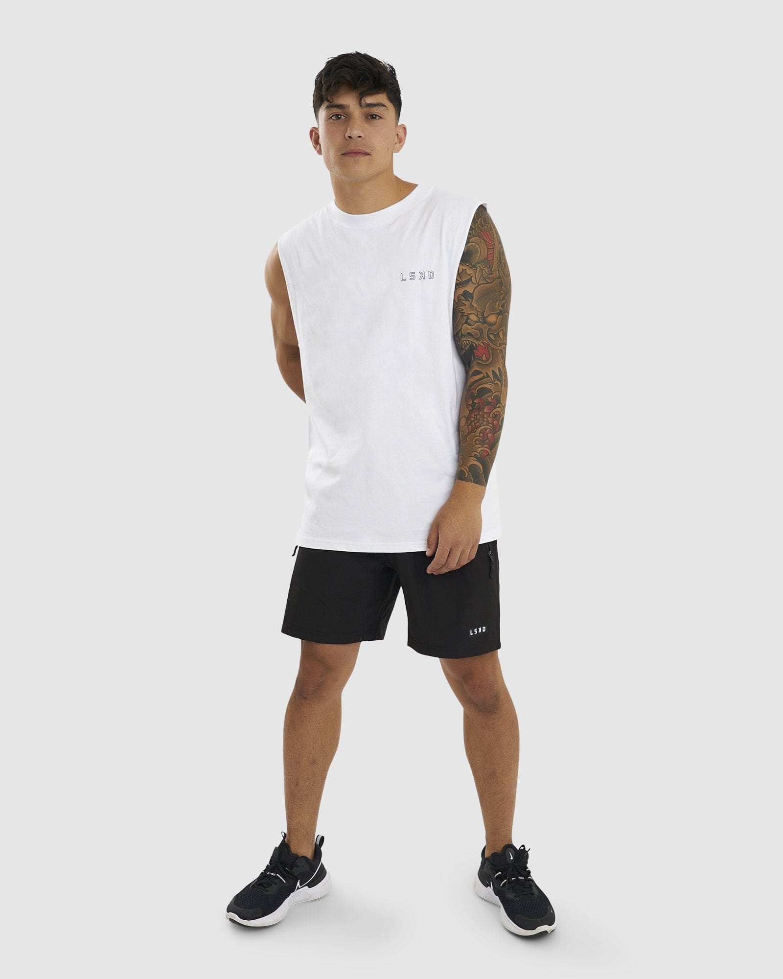 Model wearing LTD Tank Vintage Fit - White