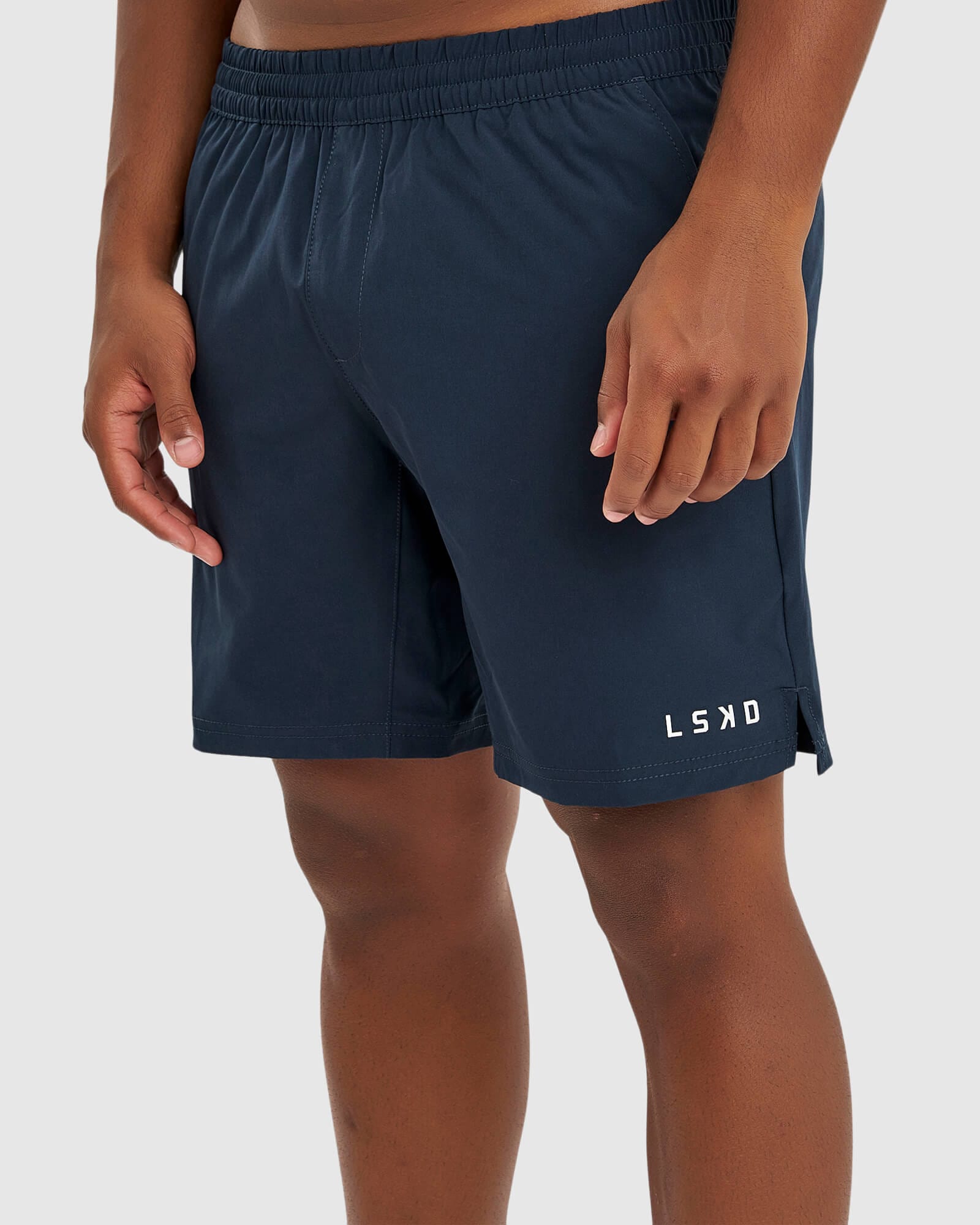 Model wearing Intensity 7" Performance Short - Carbon