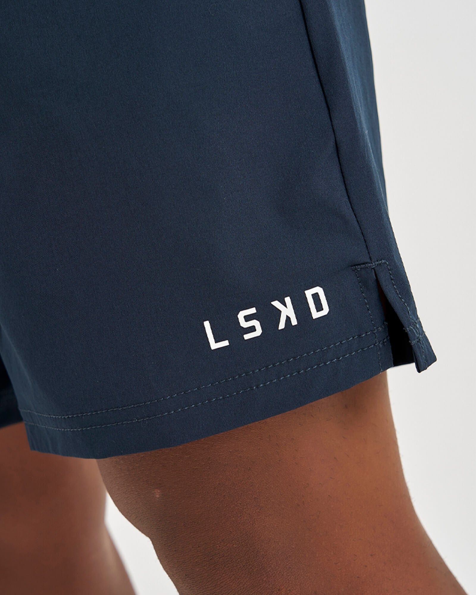 Model wearing Intensity 7" Performance Short - Carbon